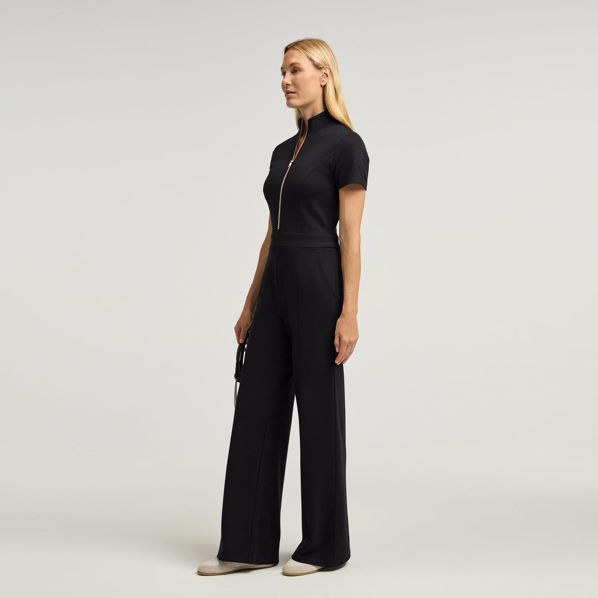 The UltraSOFT® Scrub Jumpsuit - Black + Gold Zip