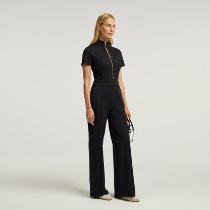 The UltraSOFT® Scrub Jumpsuit - Black + Gold Zip