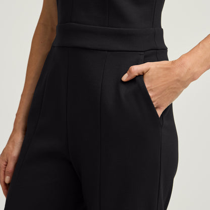 The UltraSOFT® Scrub Jumpsuit - Black + Gold Zip