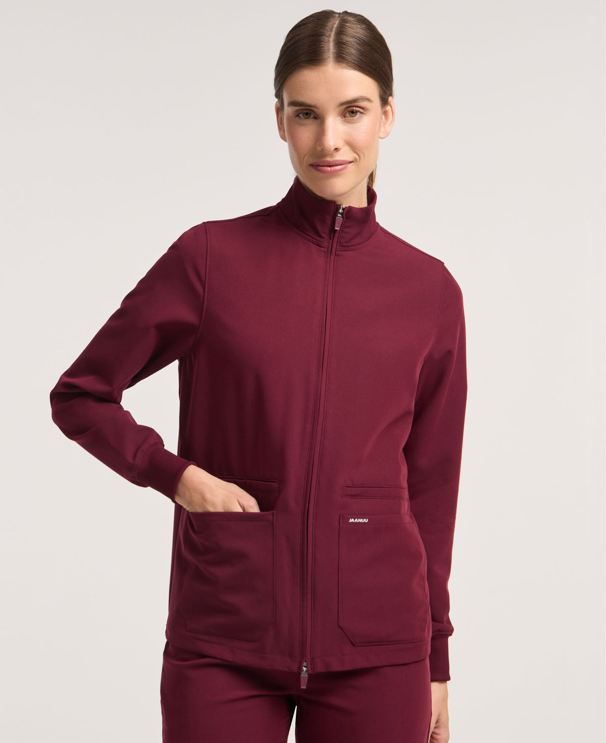Jaanuu Ceri 6-Pocket Scrub Jacket in Burgundy, product photo 1 of 6