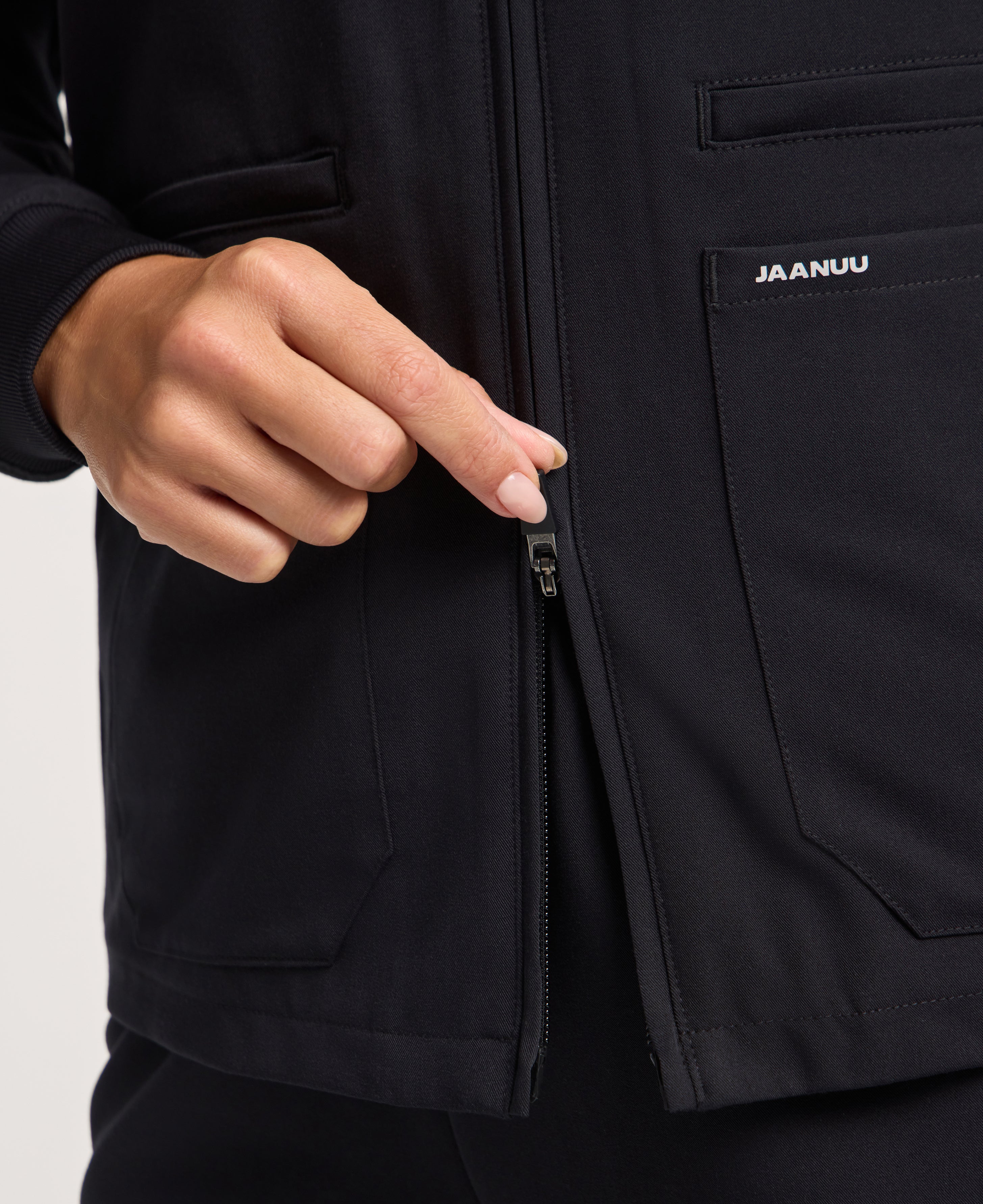 Jaanuu Ceri 6-Pocket Scrub Jacket in Black, product photo 4 of 6