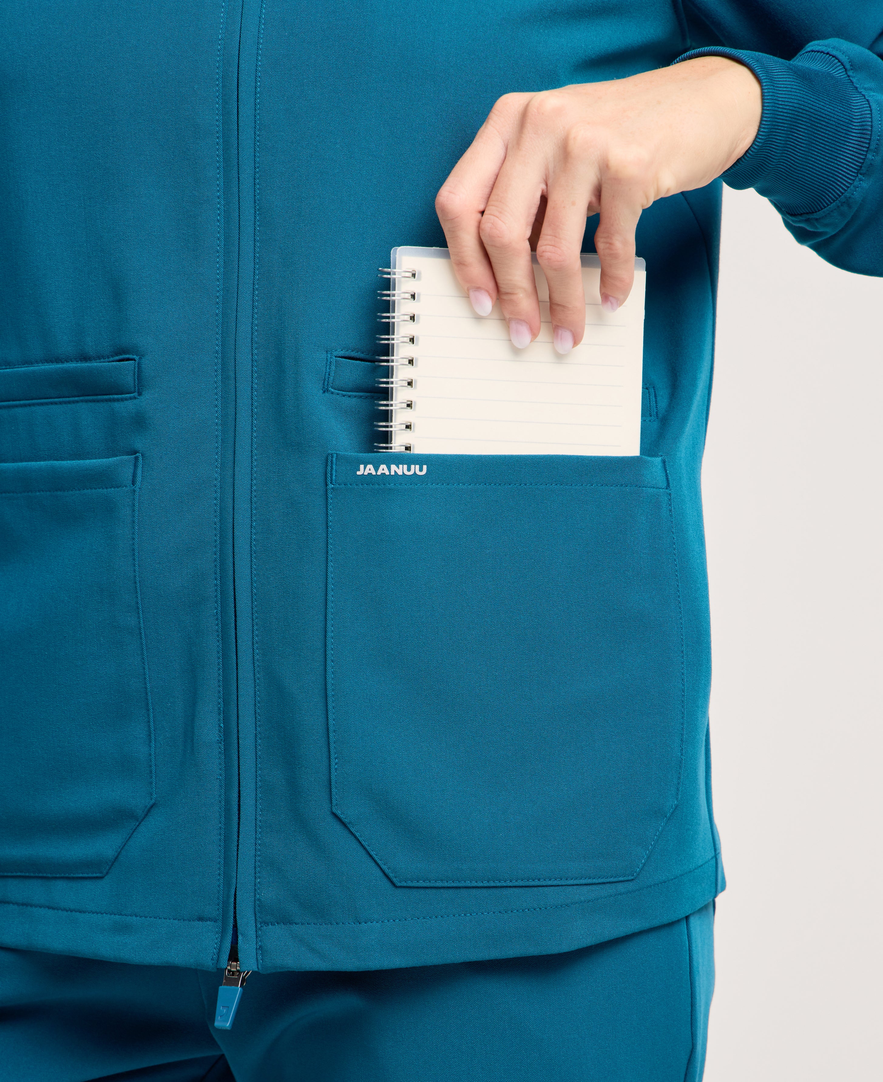 Jaanuu Ceri 6-Pocket Scrub Jacket in Caribbean Blue, product photo 6 of 6