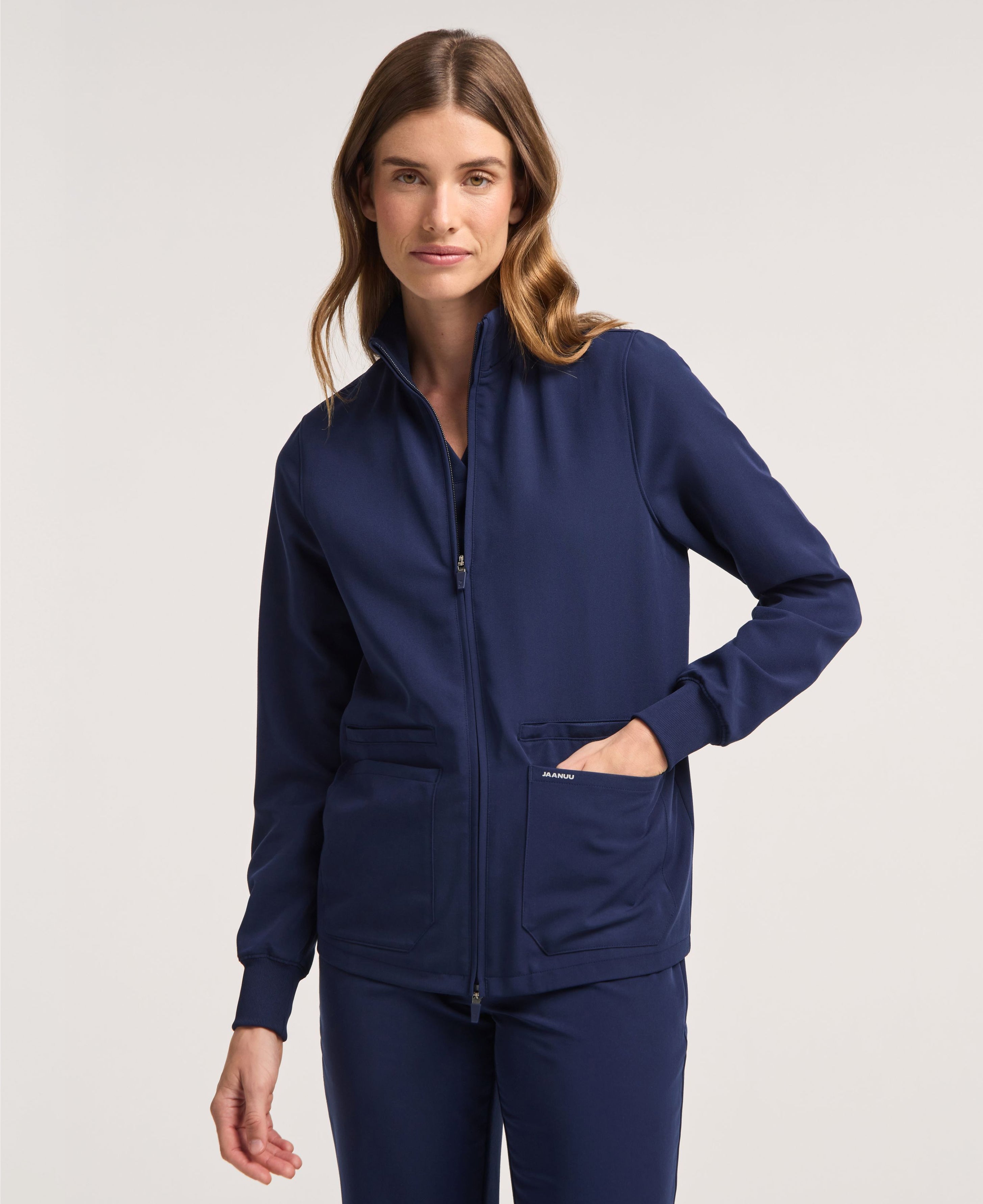 Jaanuu Ceri 6-Pocket Scrub Jacket in Midnight Navy, product photo 1 of 6