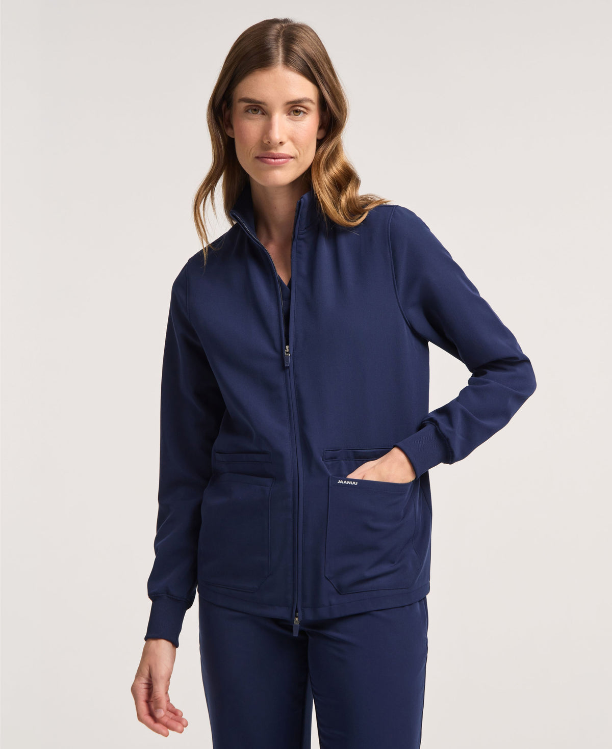 Jaanuu Ceri 6-Pocket Scrub Jacket in Midnight Navy, product photo 1 of 6