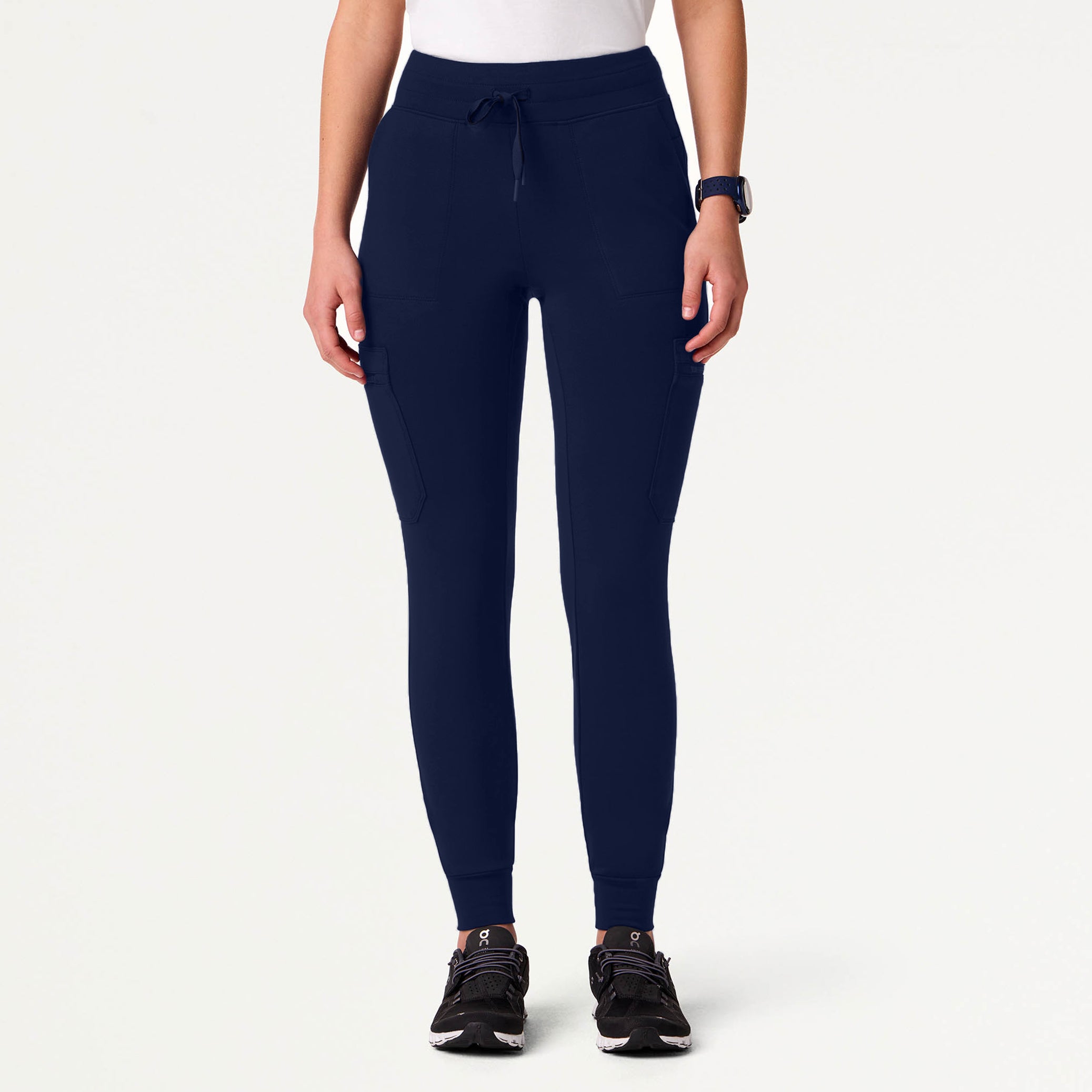 Woman wearing a Midnight Navy scrub pant