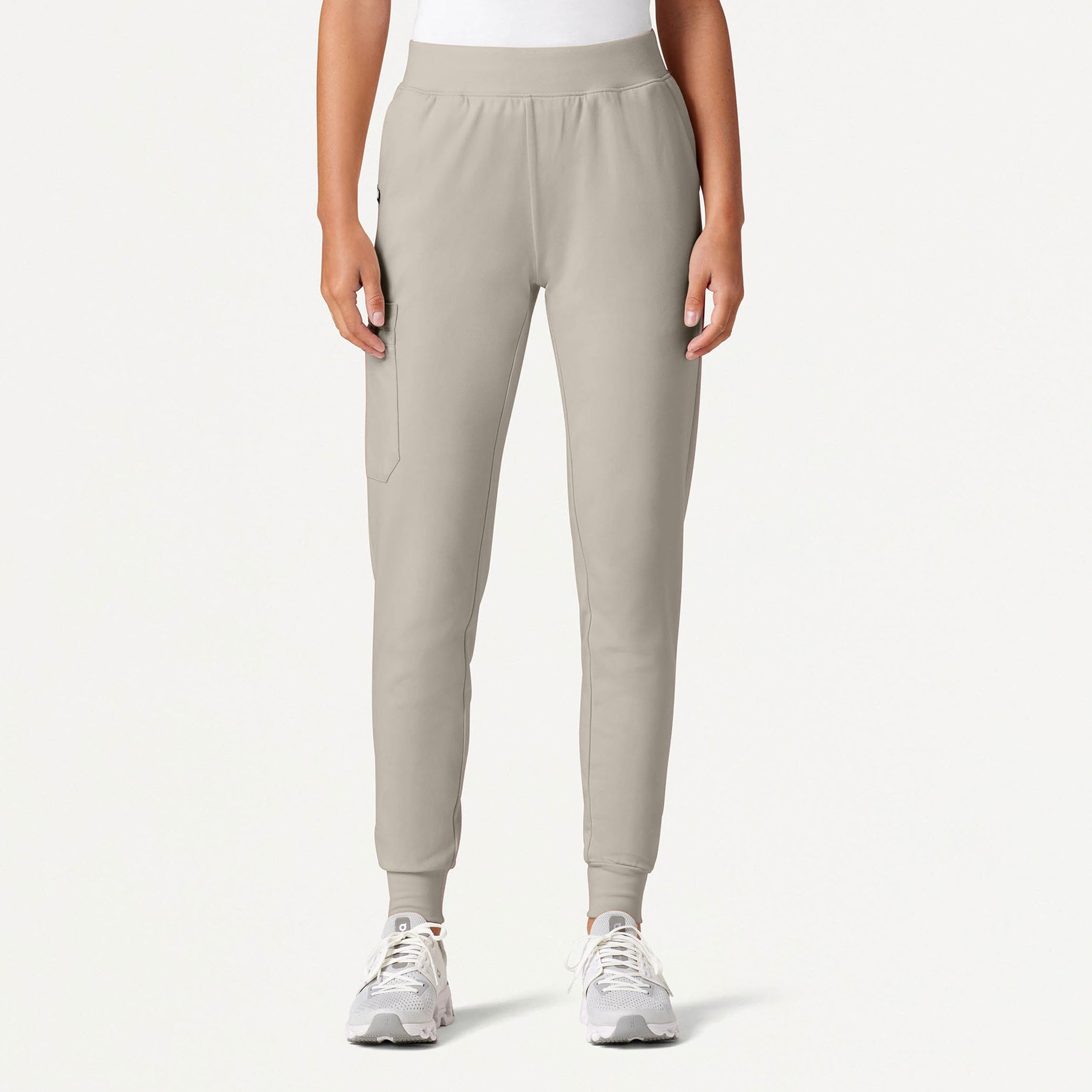 Woman wearing Fog color scrub pant.