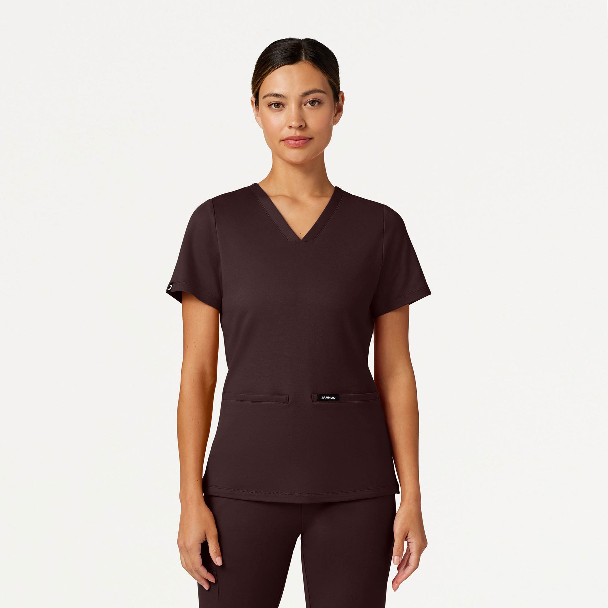 Woman wearing an Espresso scrub top