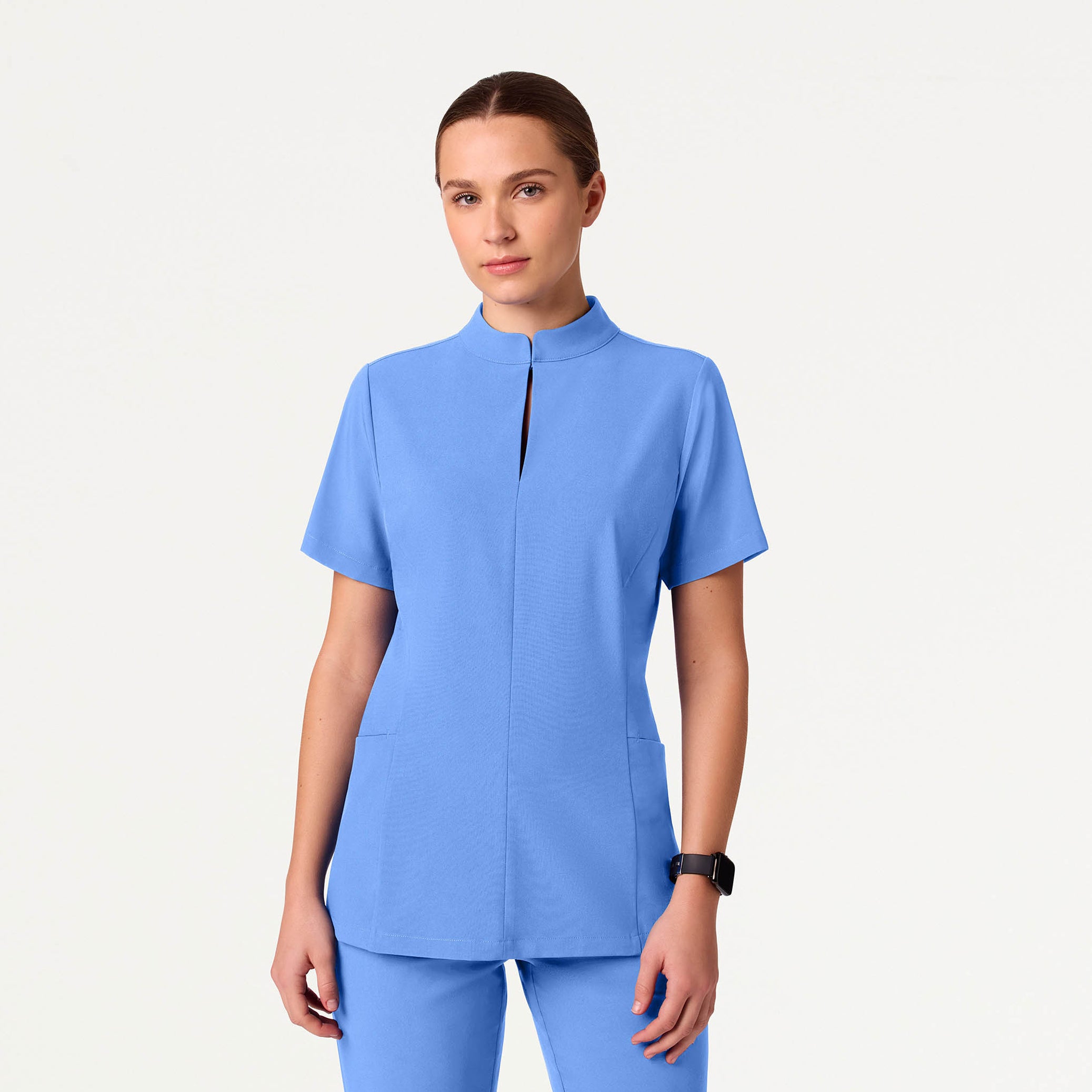 Woman wearing Ceil Blue scrubs