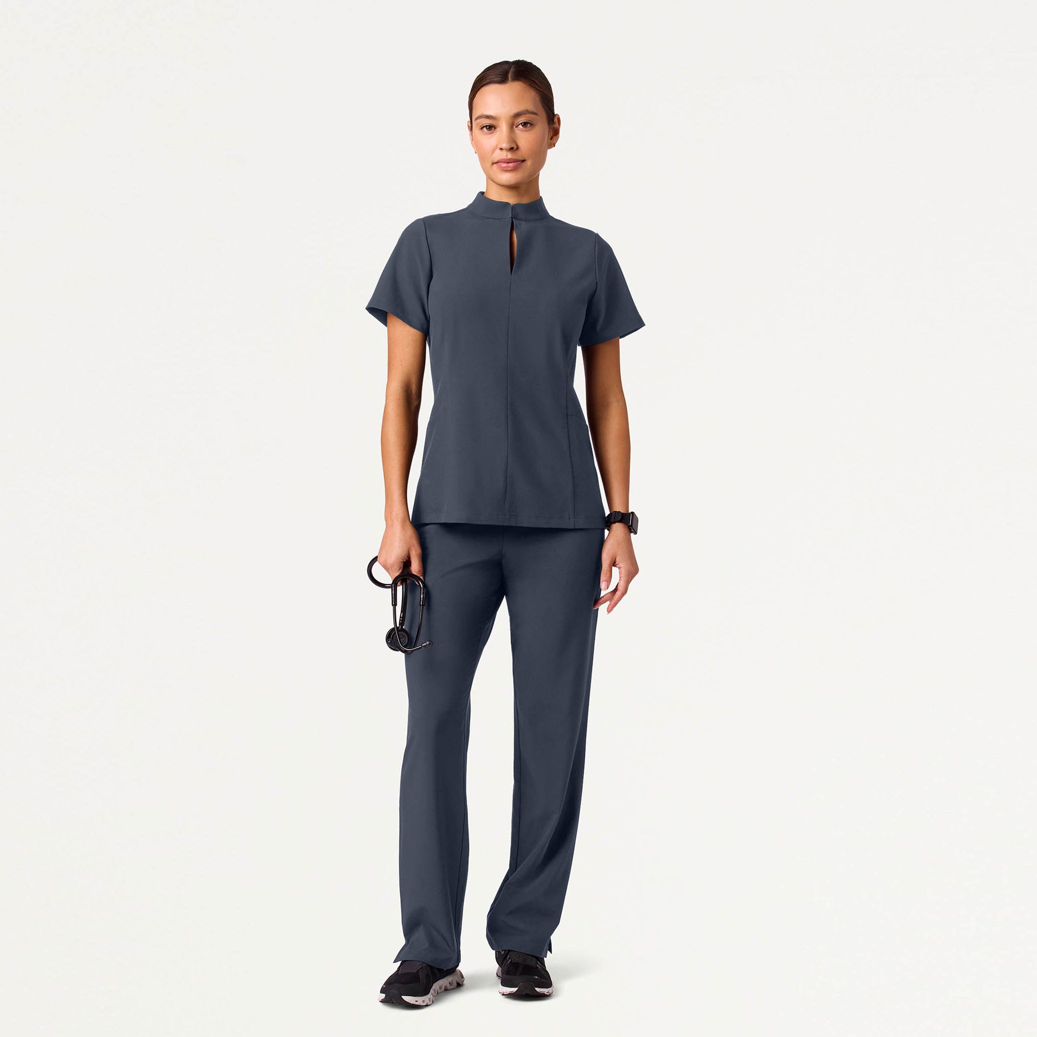 Woman wearing Carbon Gray scrubs