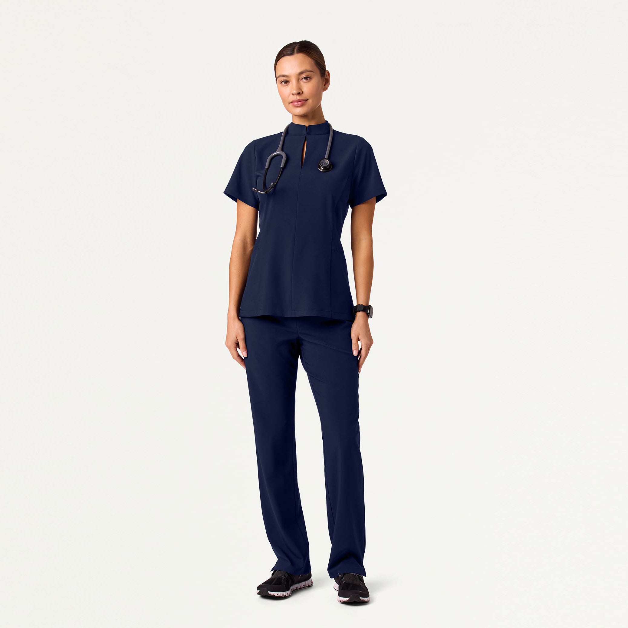 Woman wearing Midnight Navy scrubs