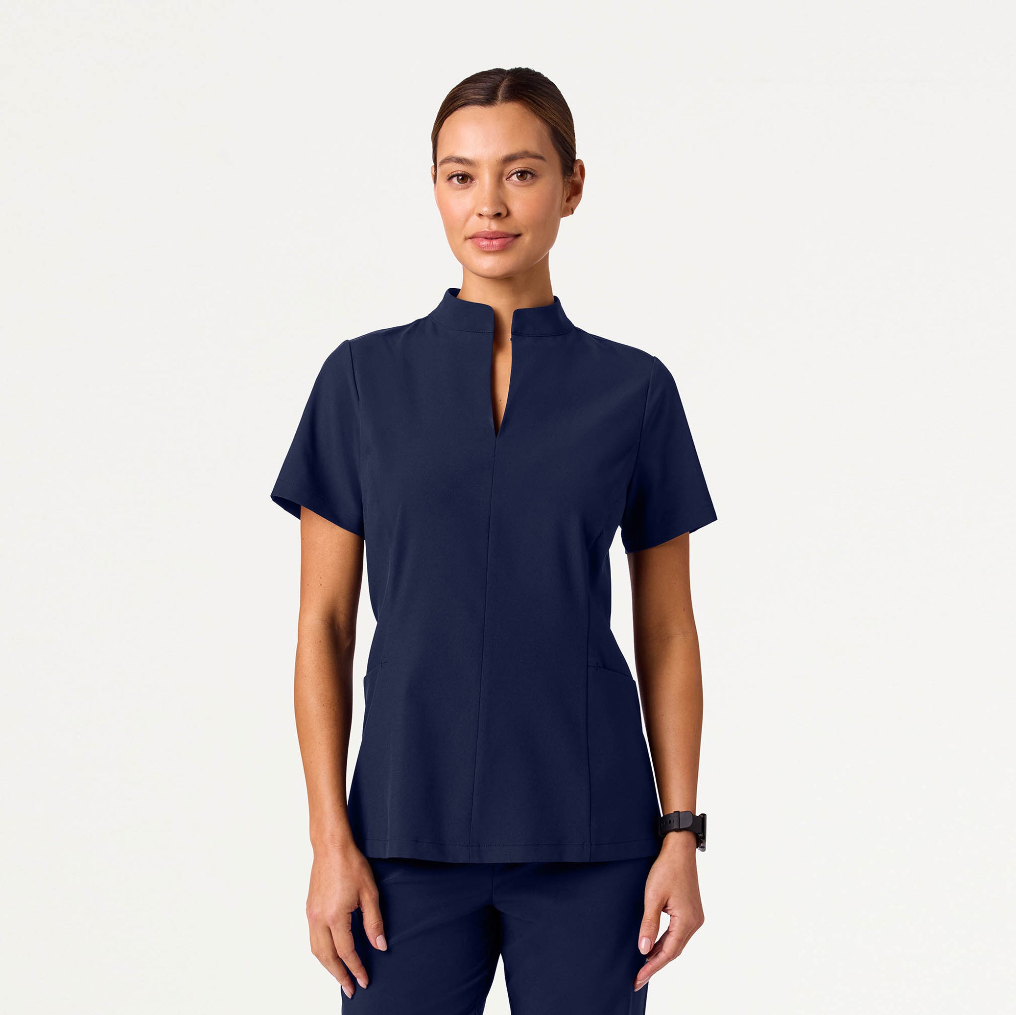 Woman wearing Midnight Navy scrubs