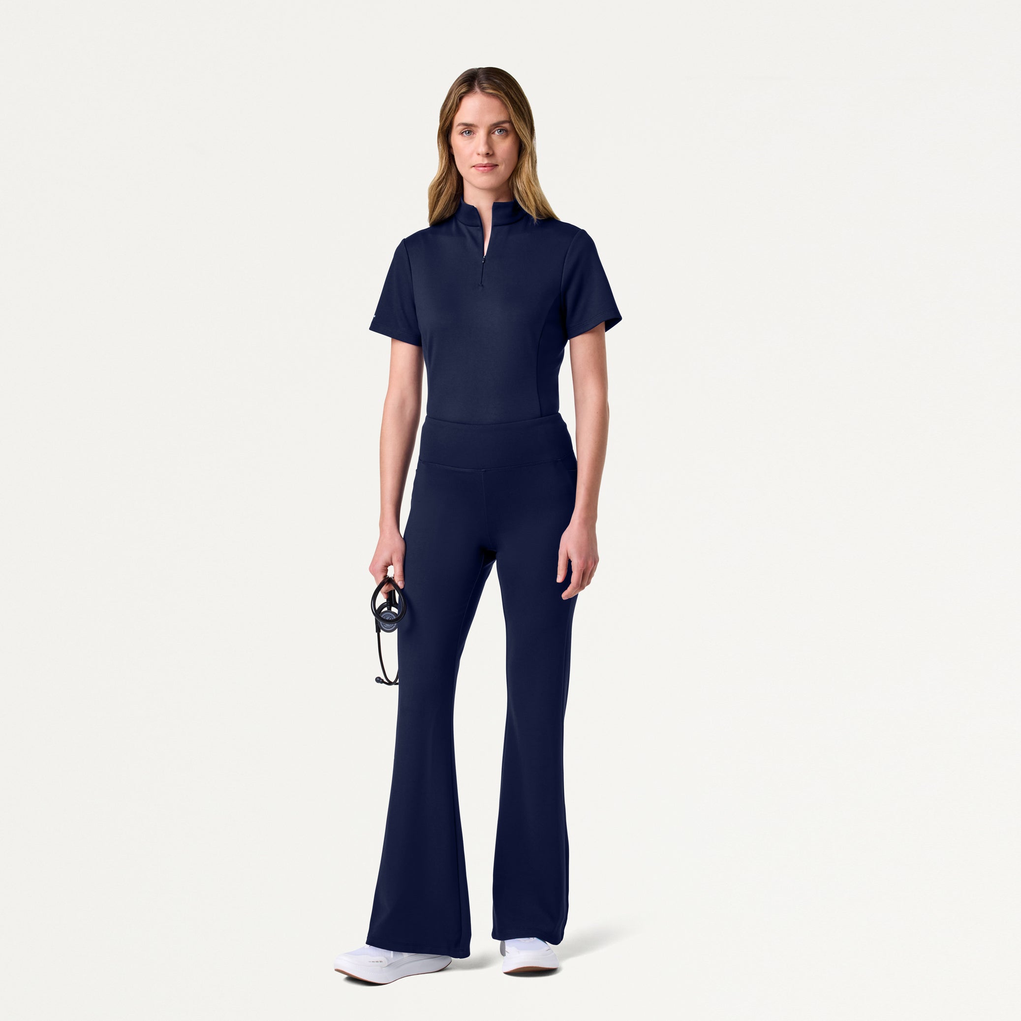 Woman in midnight navy scrub set