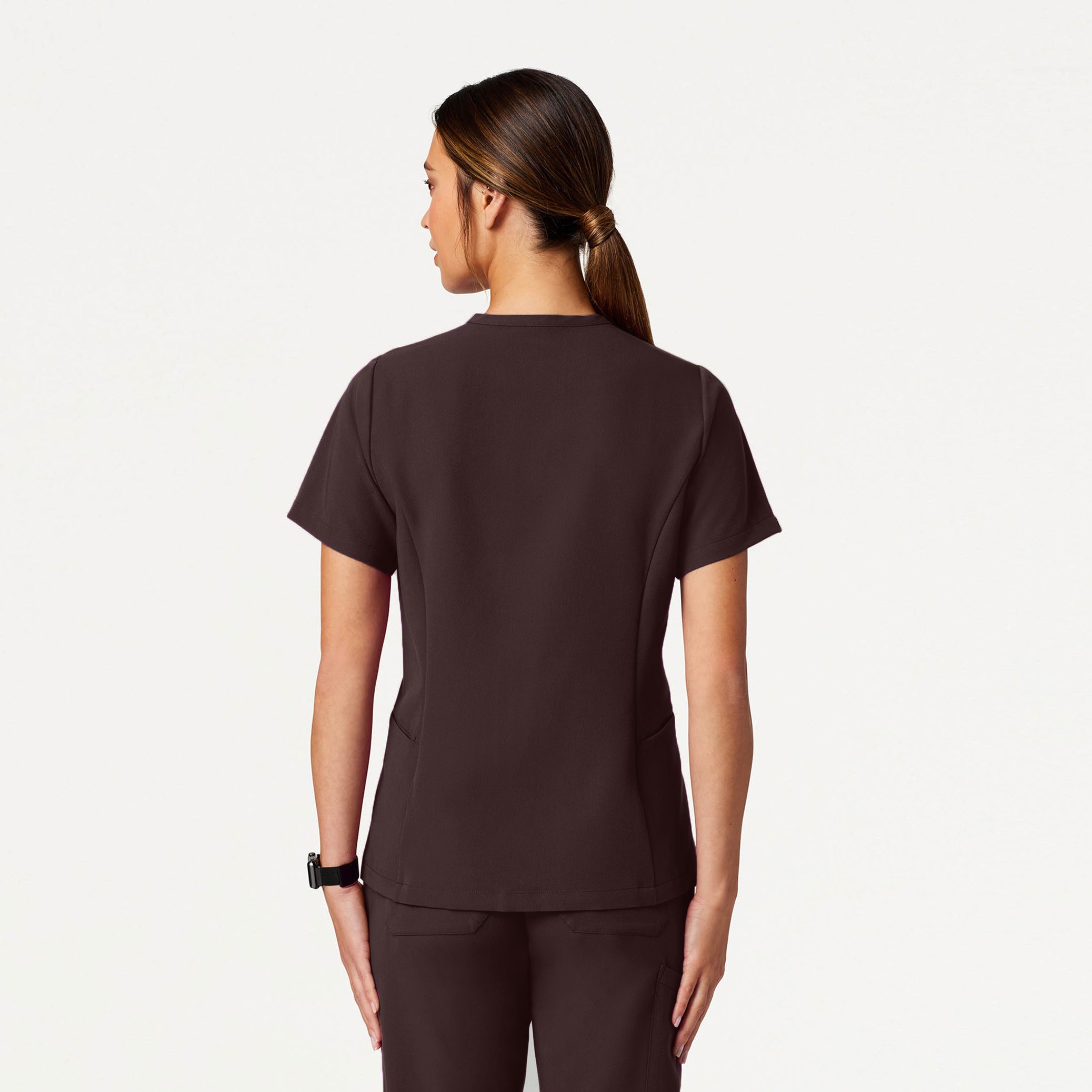 Woman wearing an Espresso scrub top