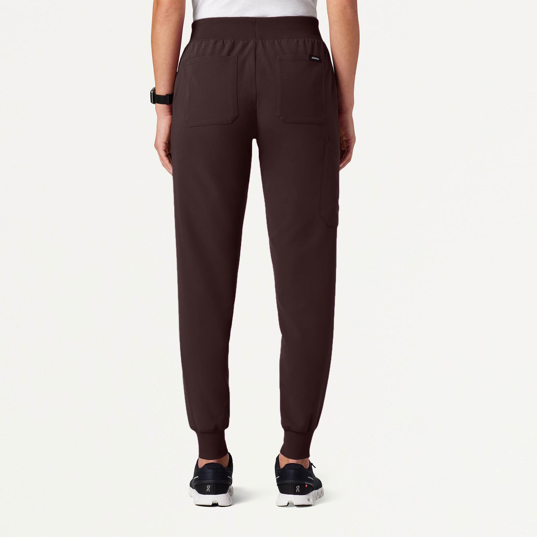 Woman wearing an Espresso scrub pant