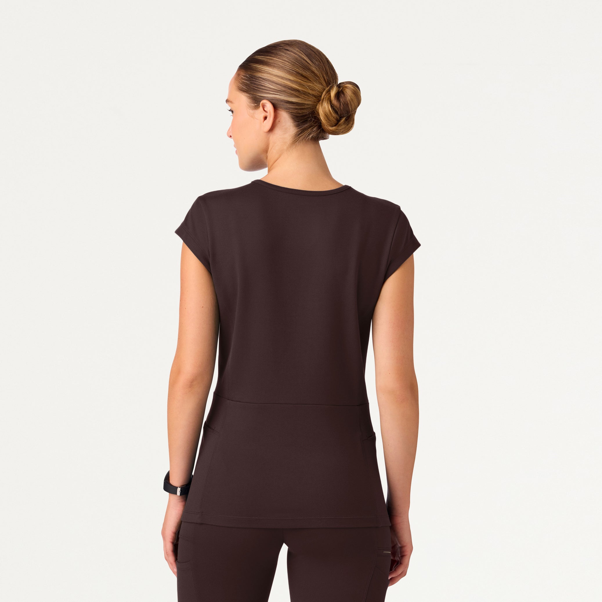 Woman wearing an Espresso scrub top