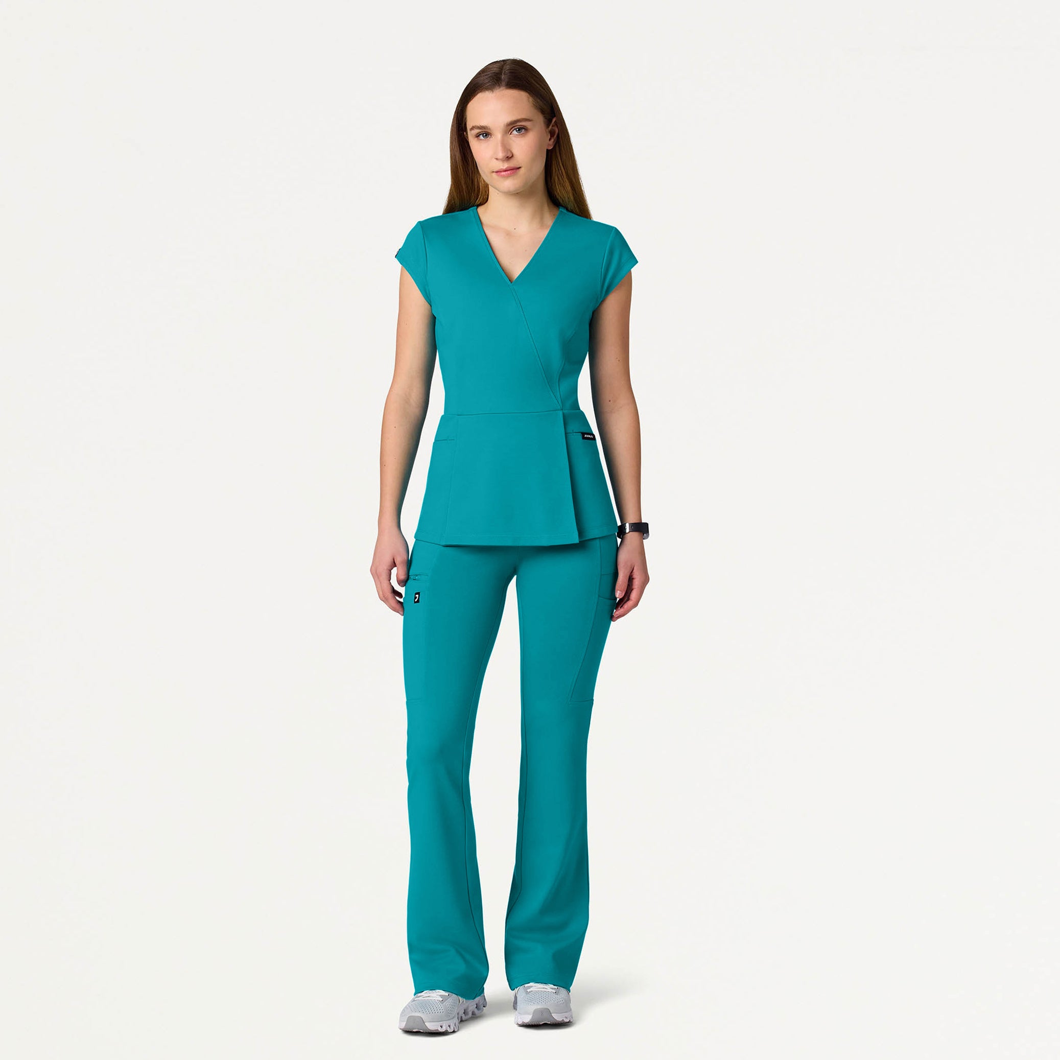 Woman wearing Teal scrub set