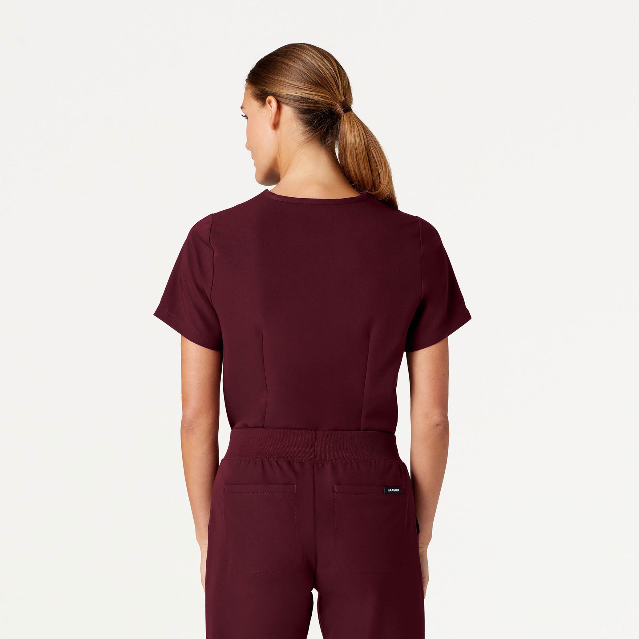 Woman wearing Burgundy scrubs