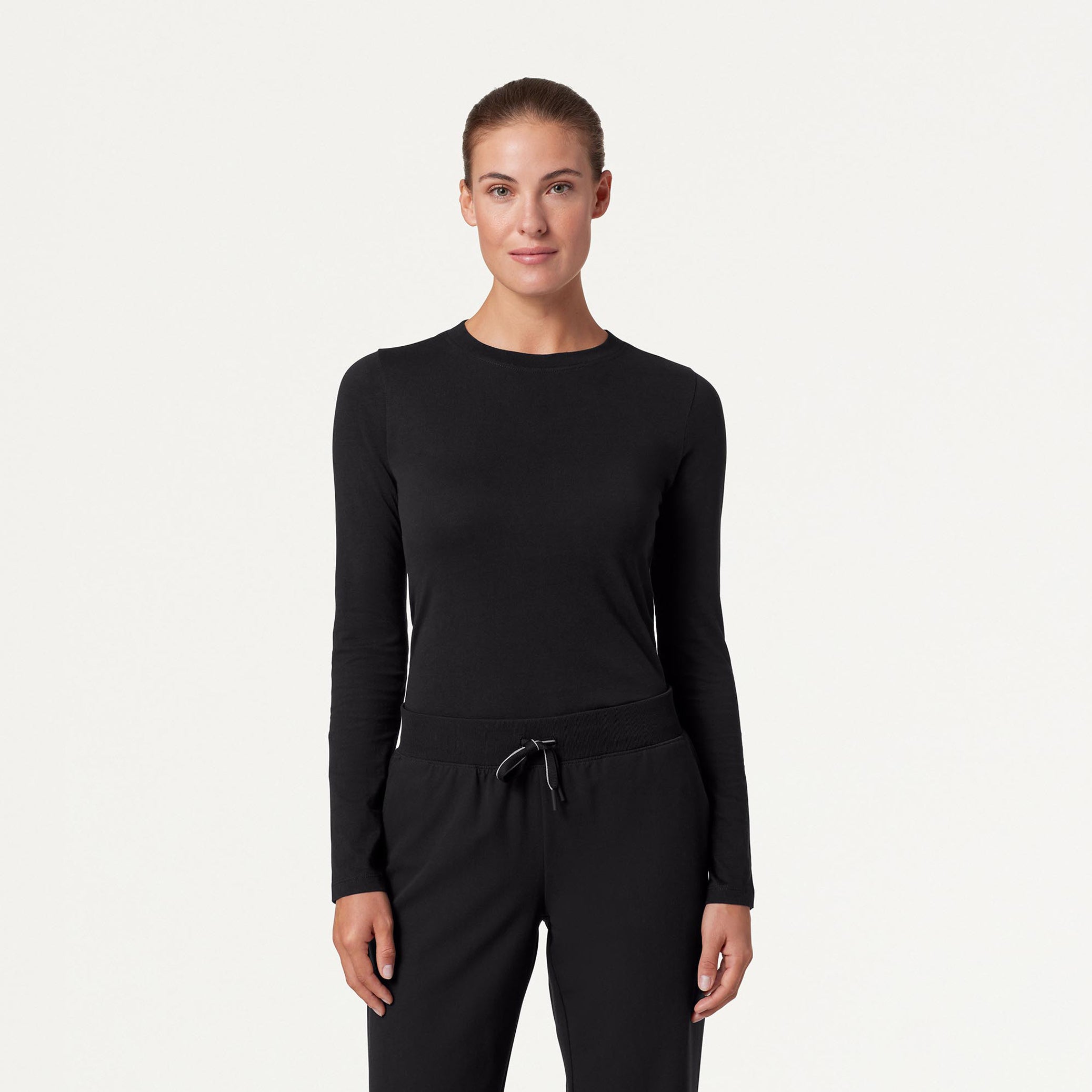 Woman wearing Black underscrub