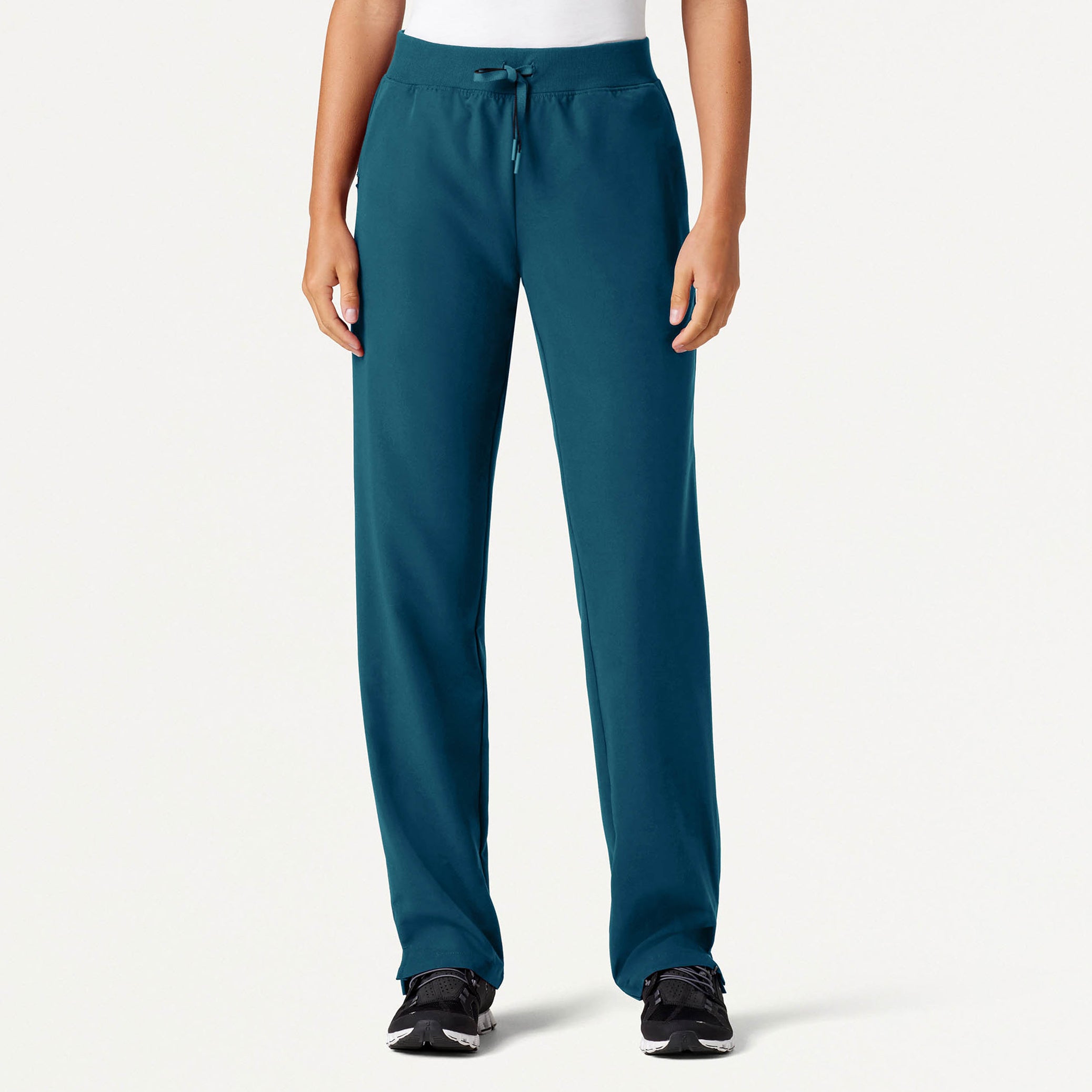 Woman wearing Caribbean Blue scrubs 