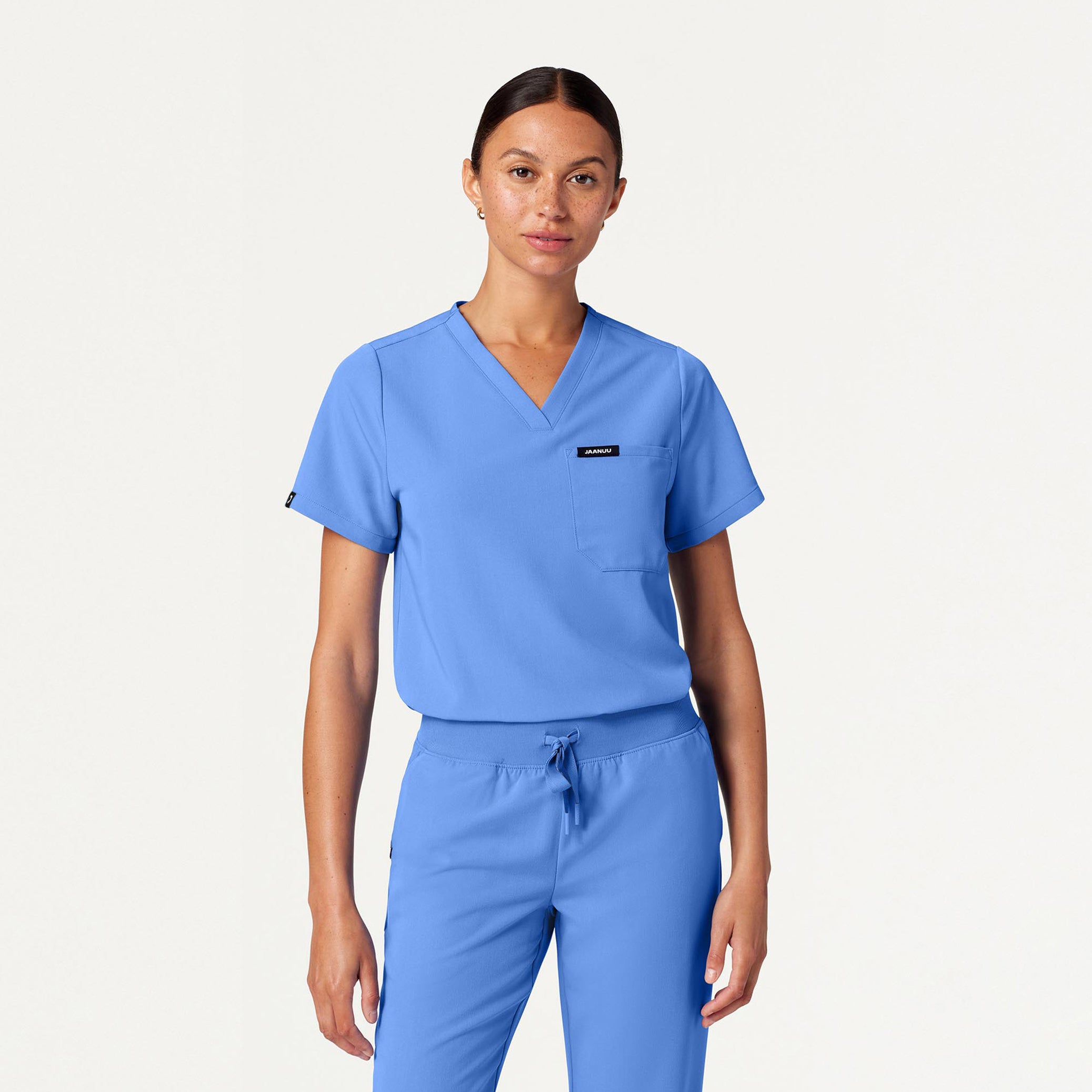 Woman wearing Ceil Blue scrubs