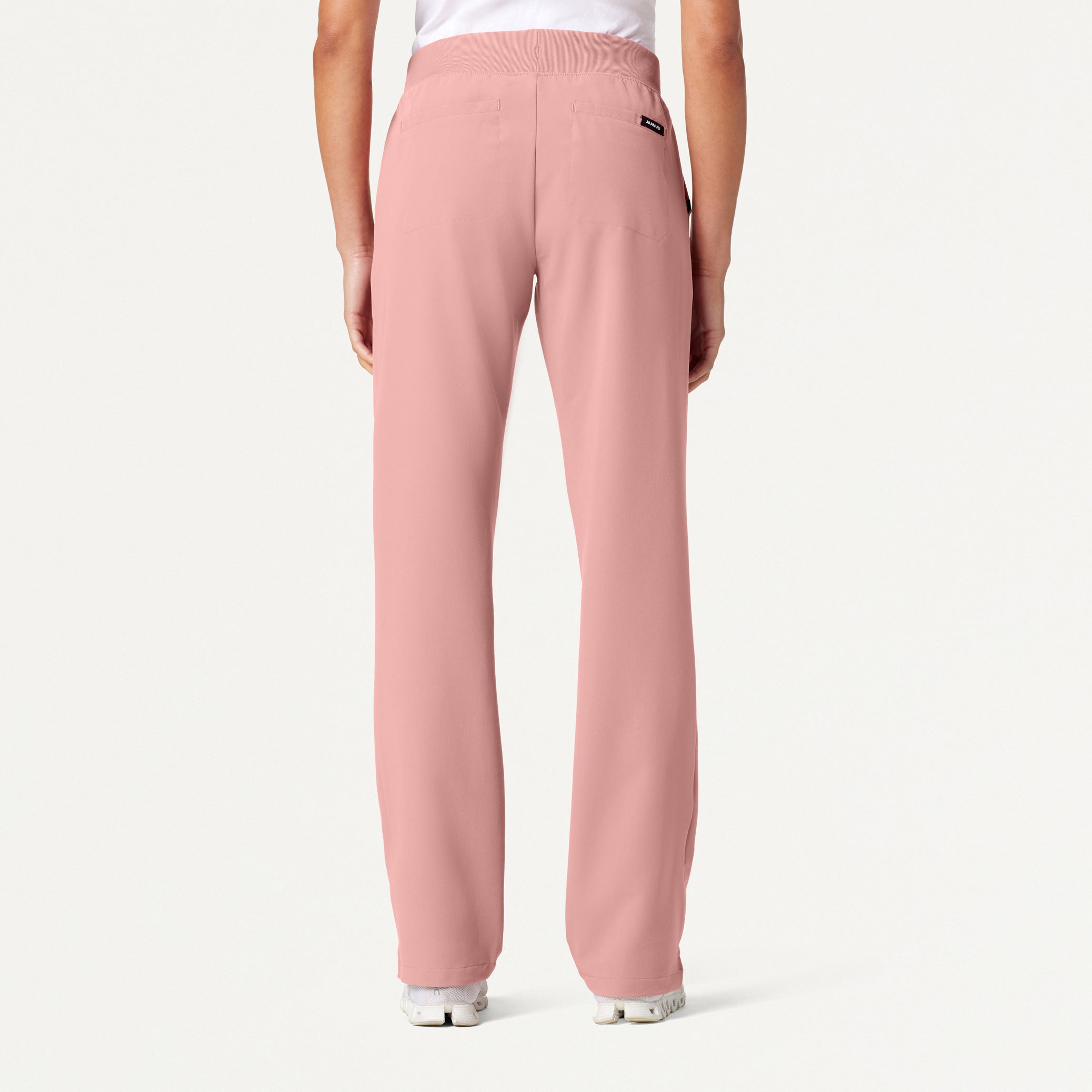 Woman wearing Mauve scrubs