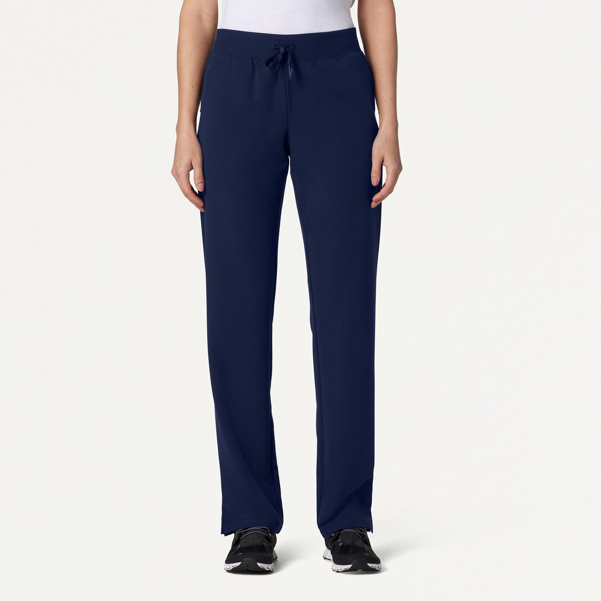 Woman wearing Midnight Navy scrubs