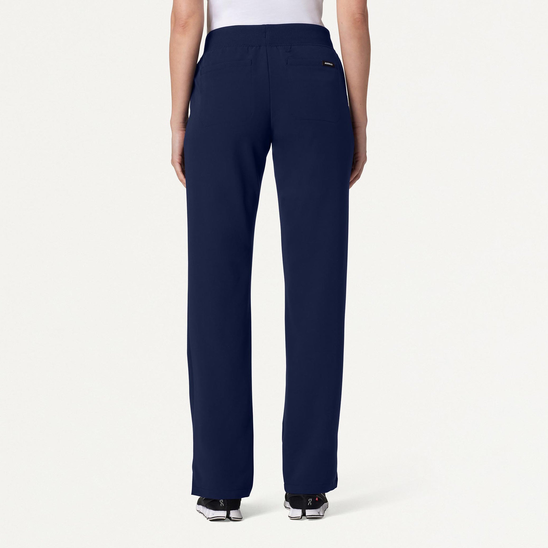 Woman wearing Midnight Navy scrubs
