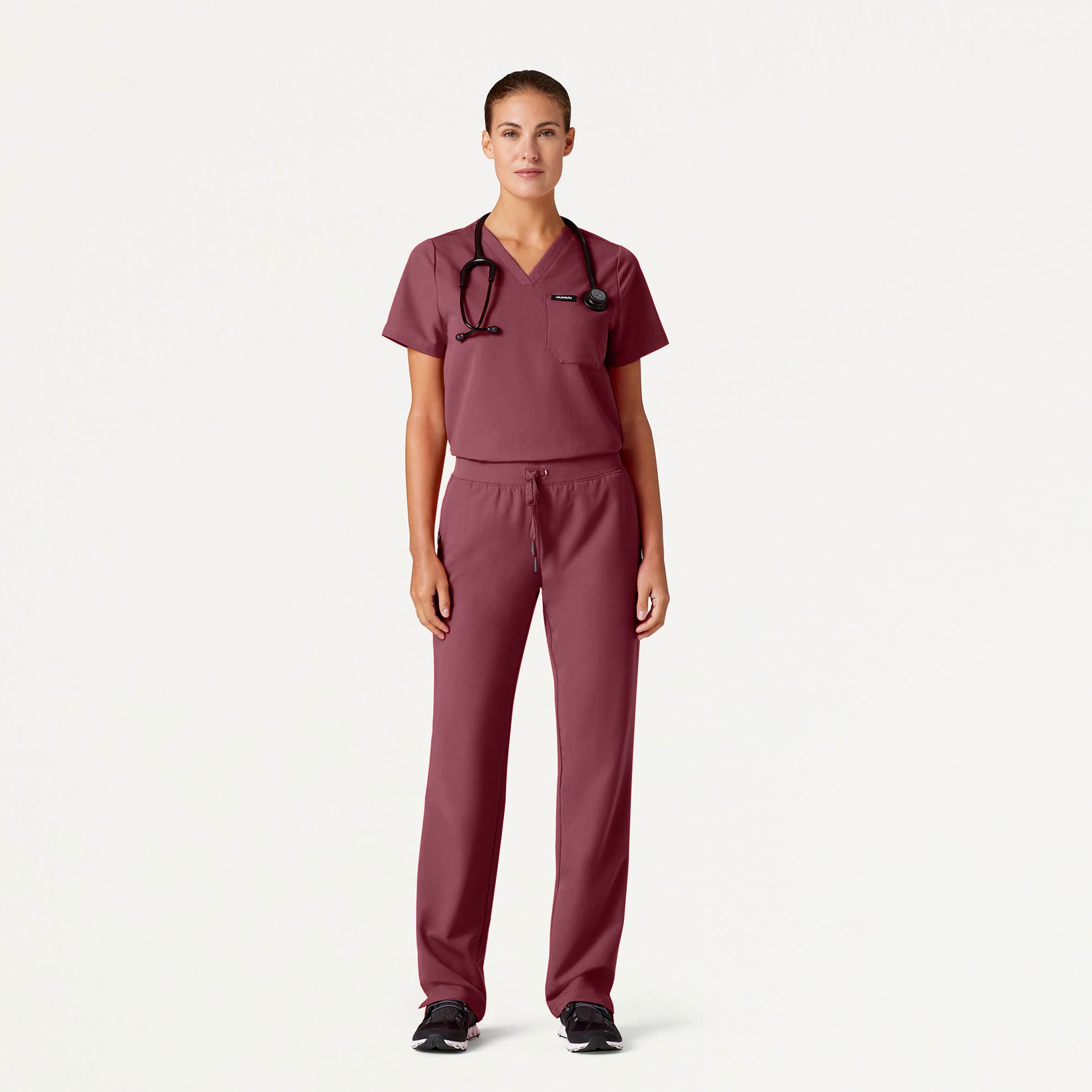 Woman wearing Rosewood scrubs