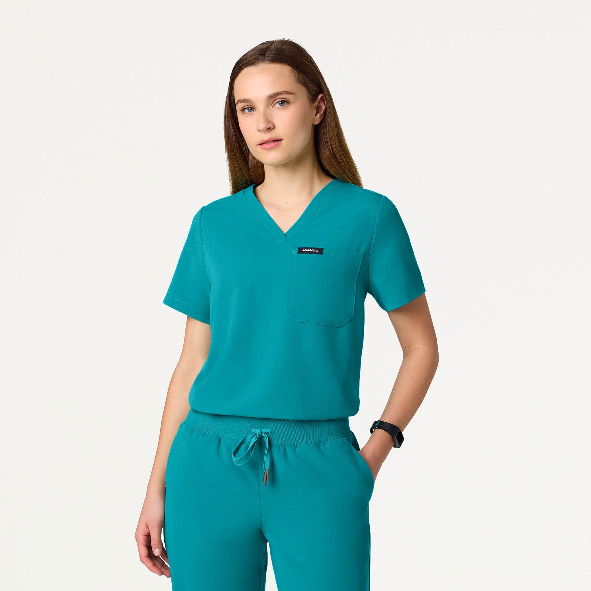 Woman wearing Teal scrub top