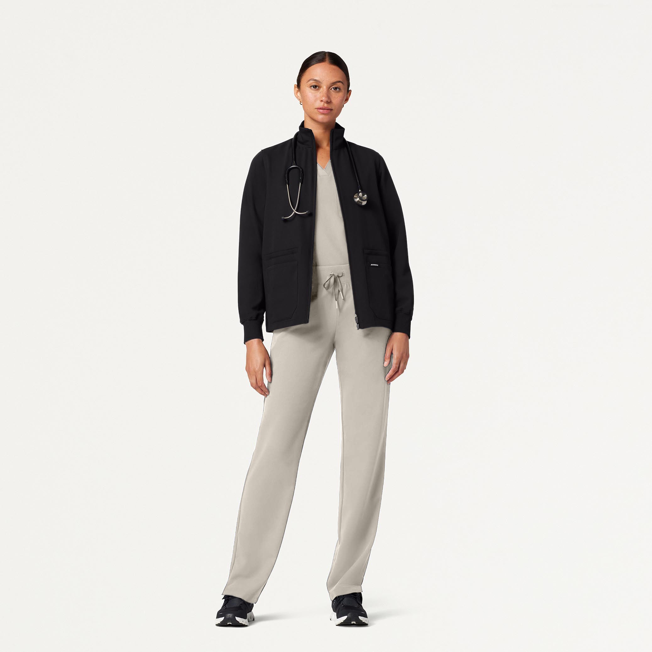 Woman wearing Fog scrub set with scrub jacket