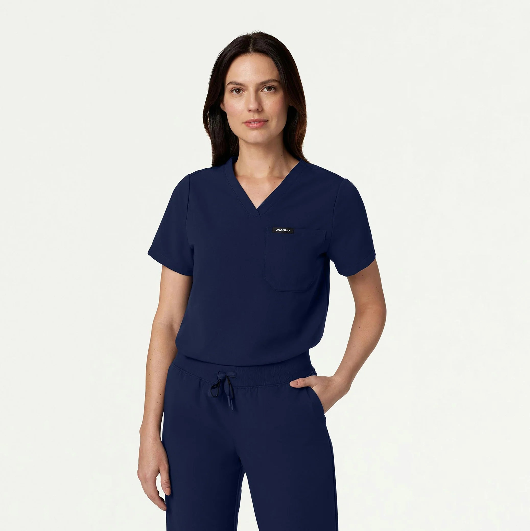 Woman wearing navy scrub top
