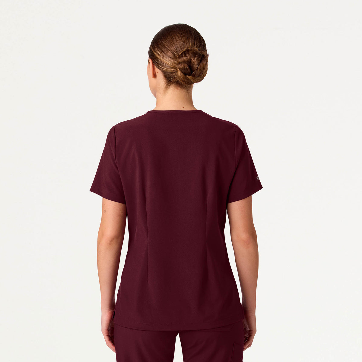 Woman wearing Burgundy scrubs