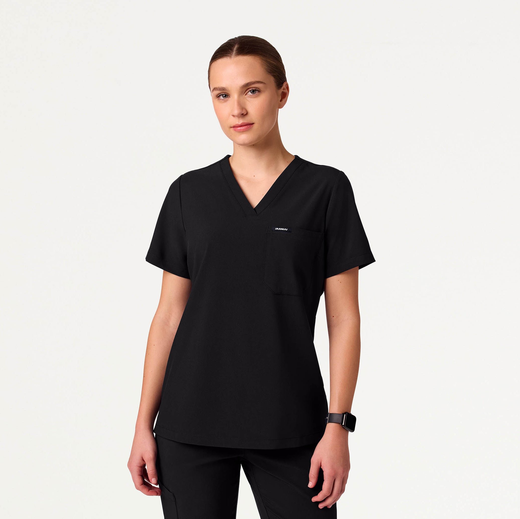 Woman wearing Black scrub top