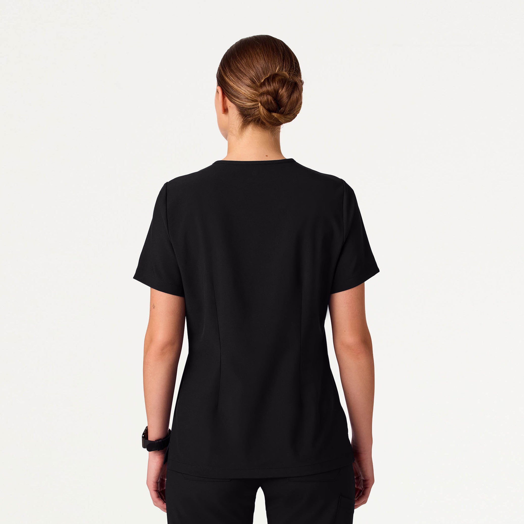 Woman wearing Black scrub top