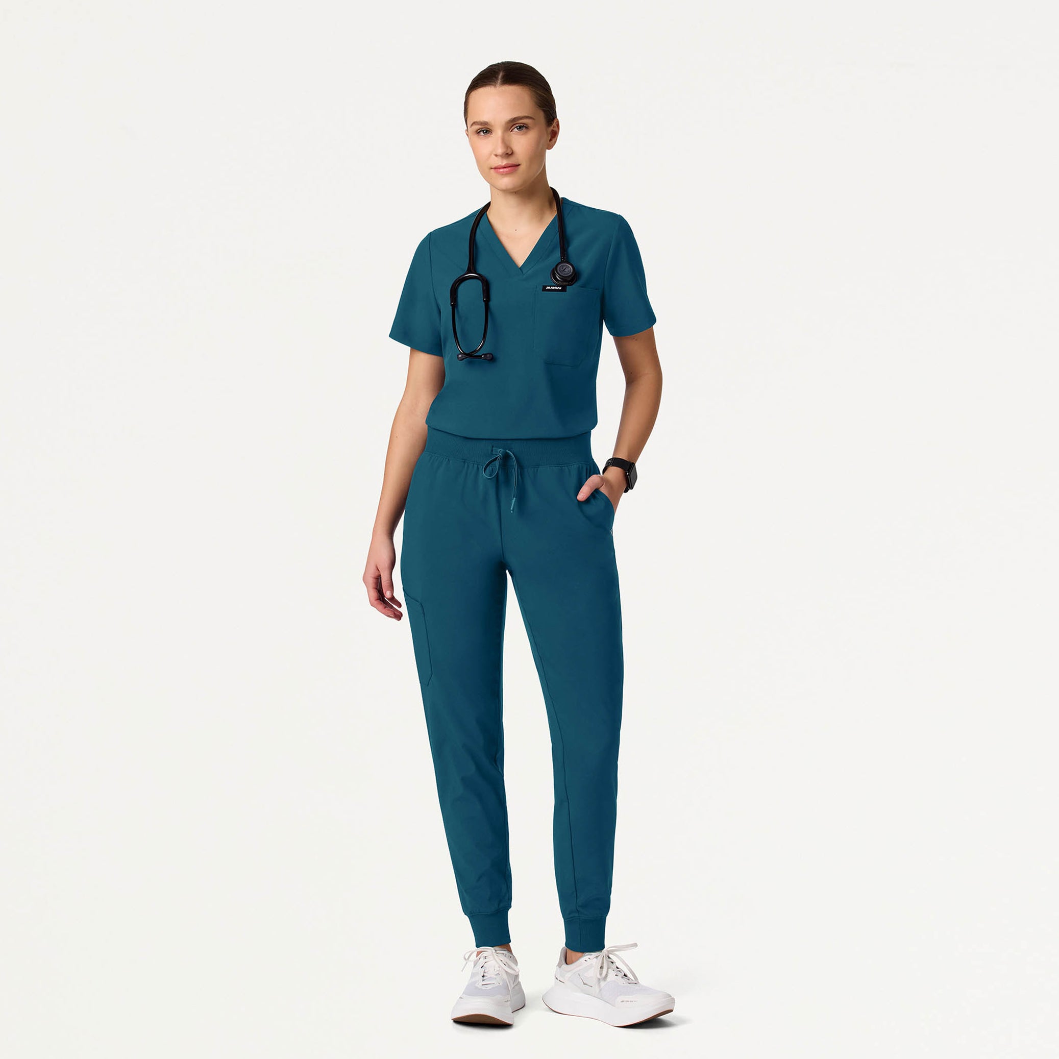 Woman wearing Caribbean Blue scrubs