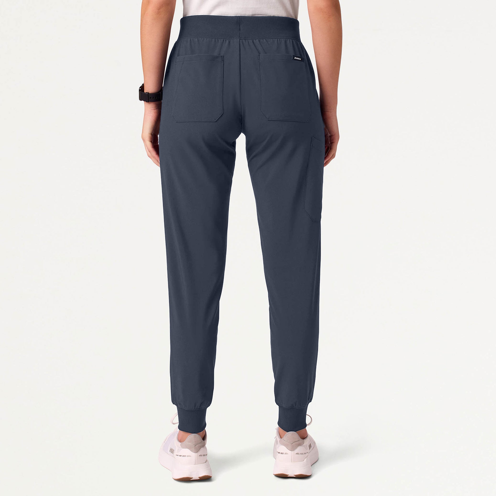 Woman wearing Carbon Gray scrub pant