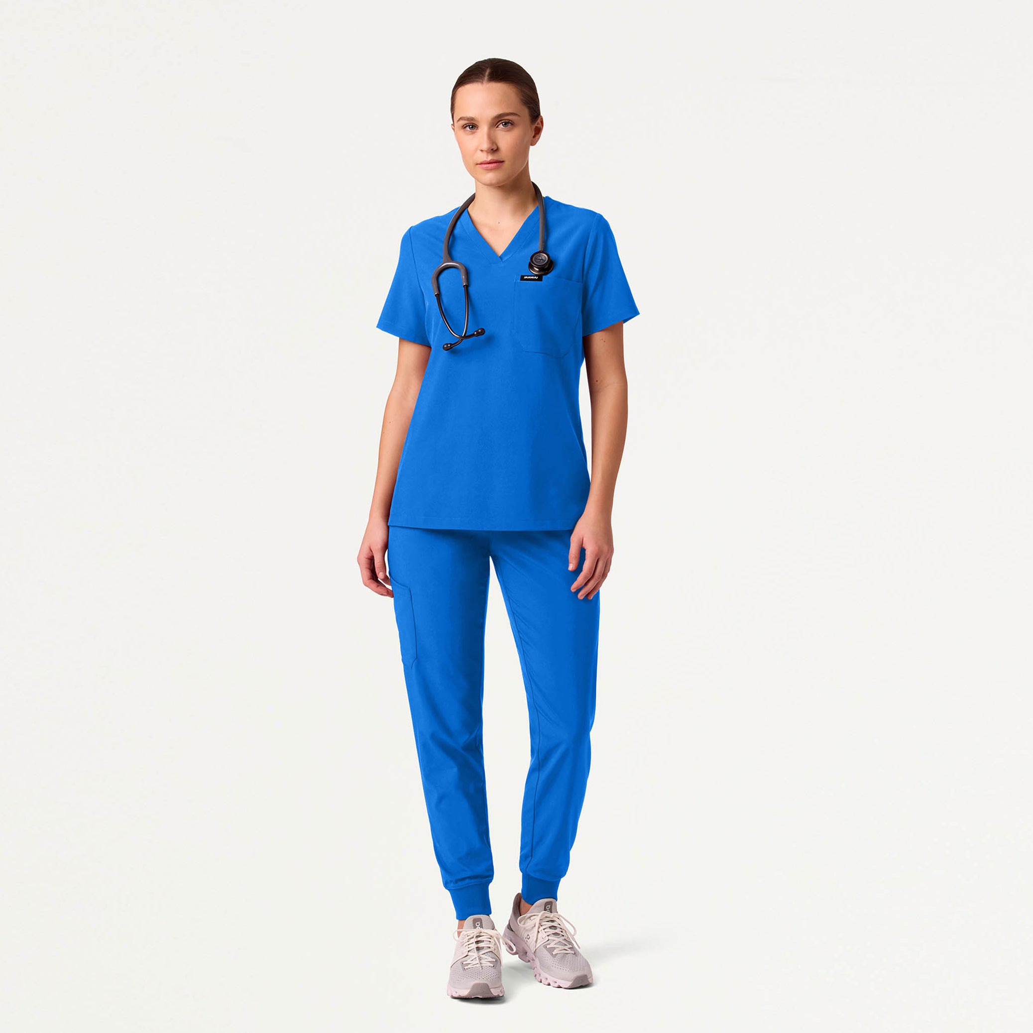 Woman wearing Royal Blue scrub set