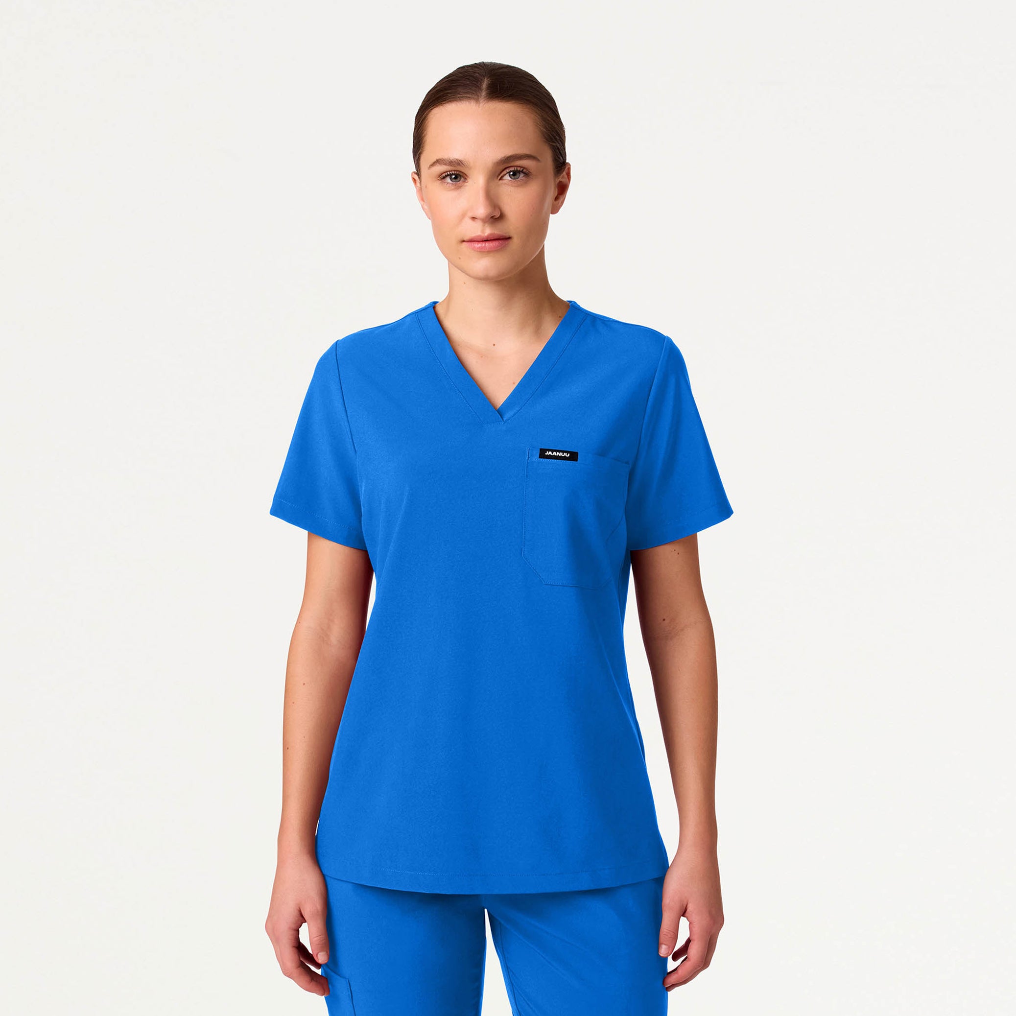 Woman wearing Royal Blue scrub top