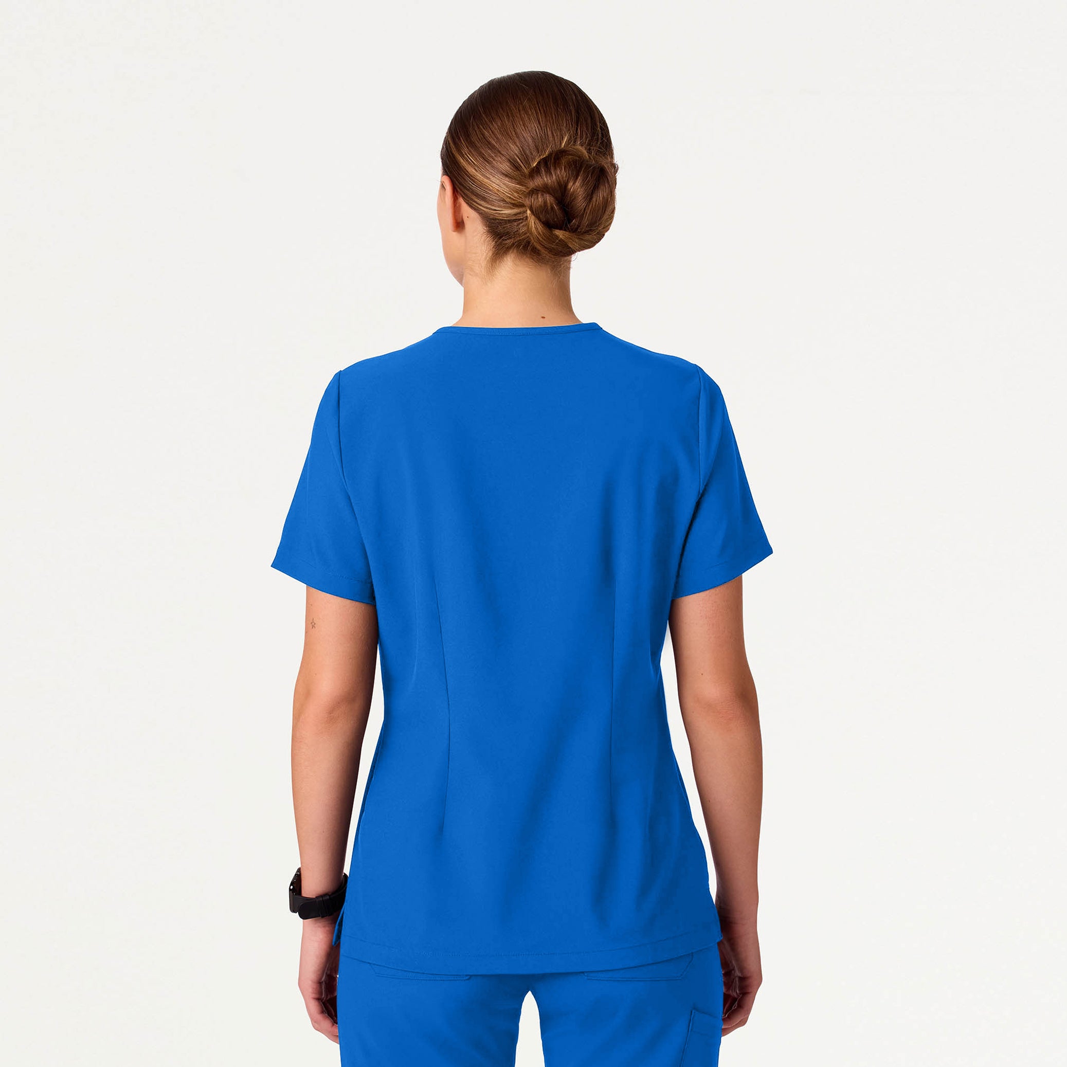 Woman wearing Royal Blue scrub top
