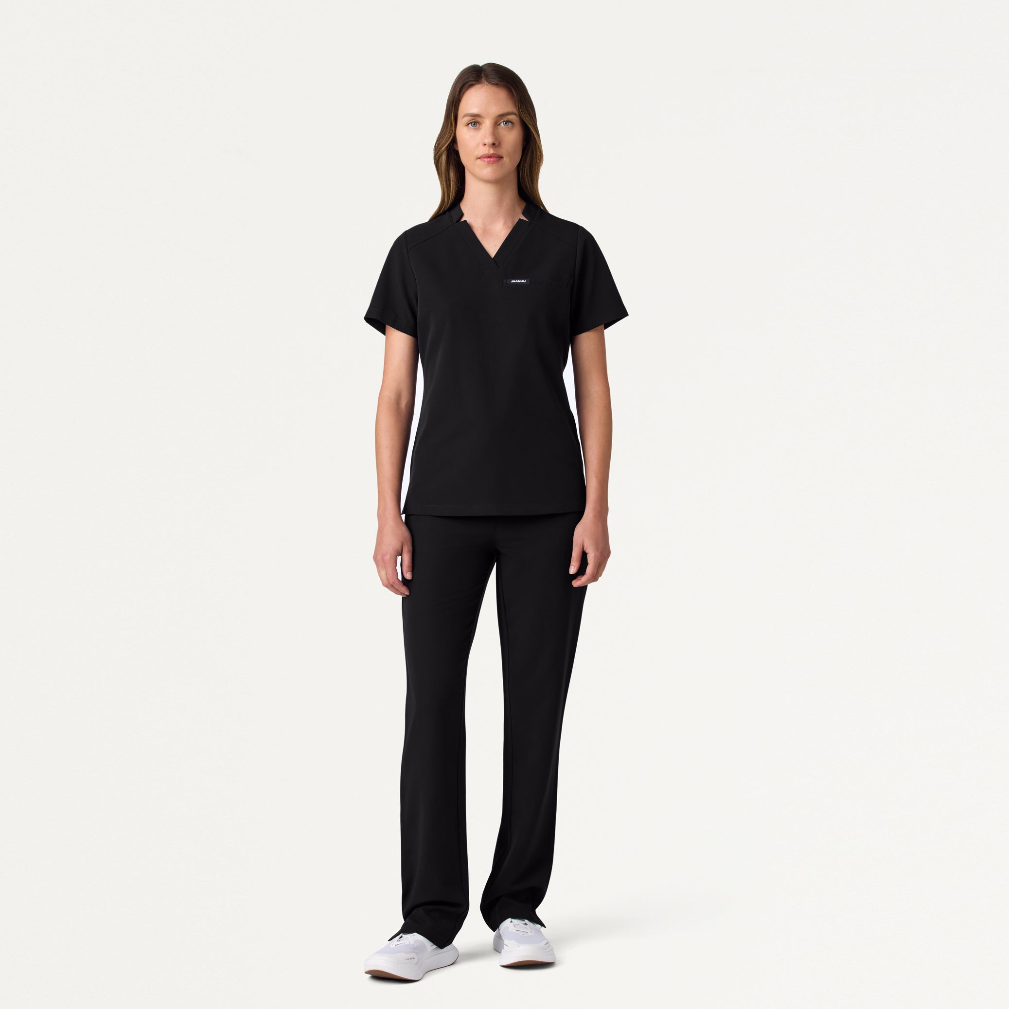 Woman wearing Black scrub set.
