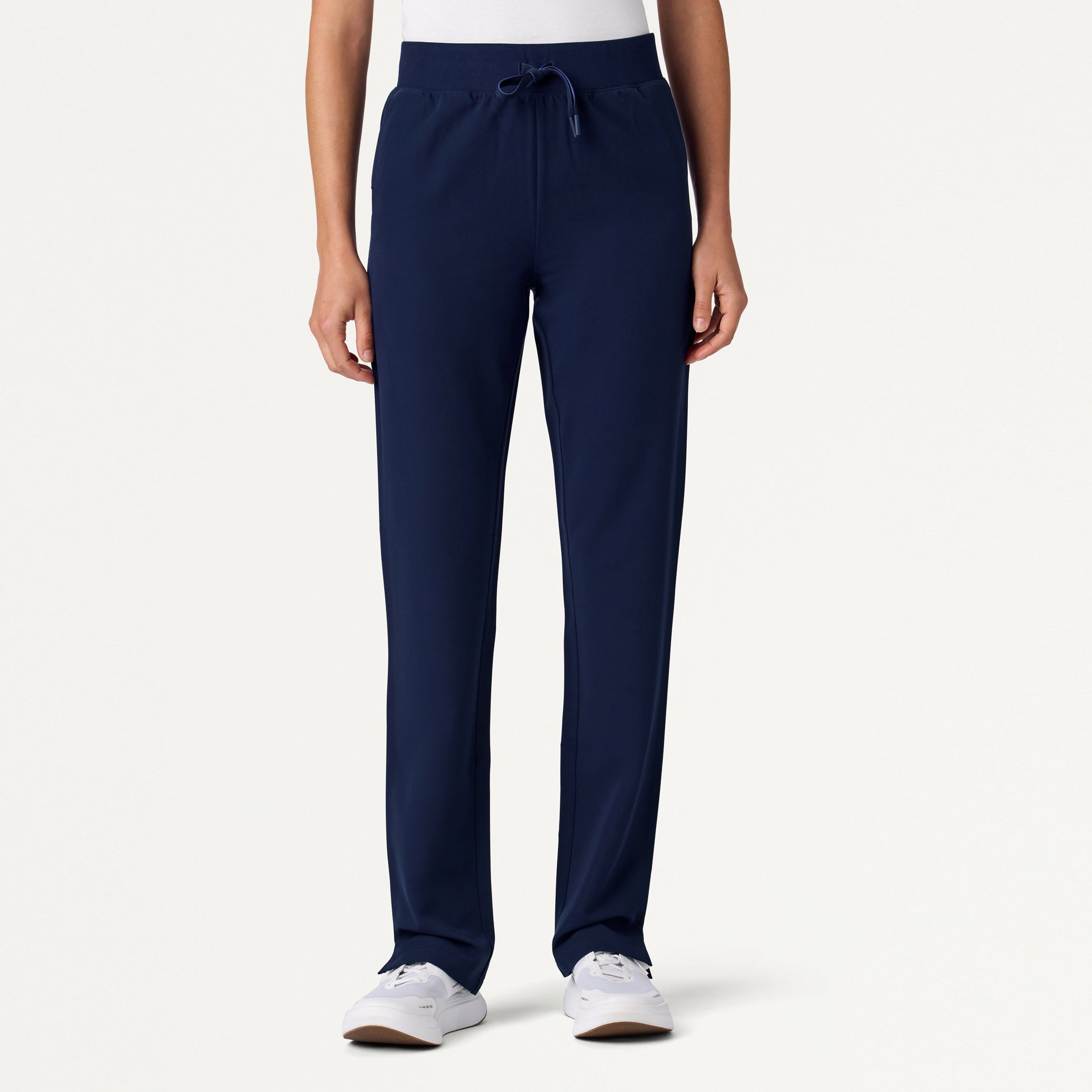 Woman wearing Midnight Navy scrub pant.