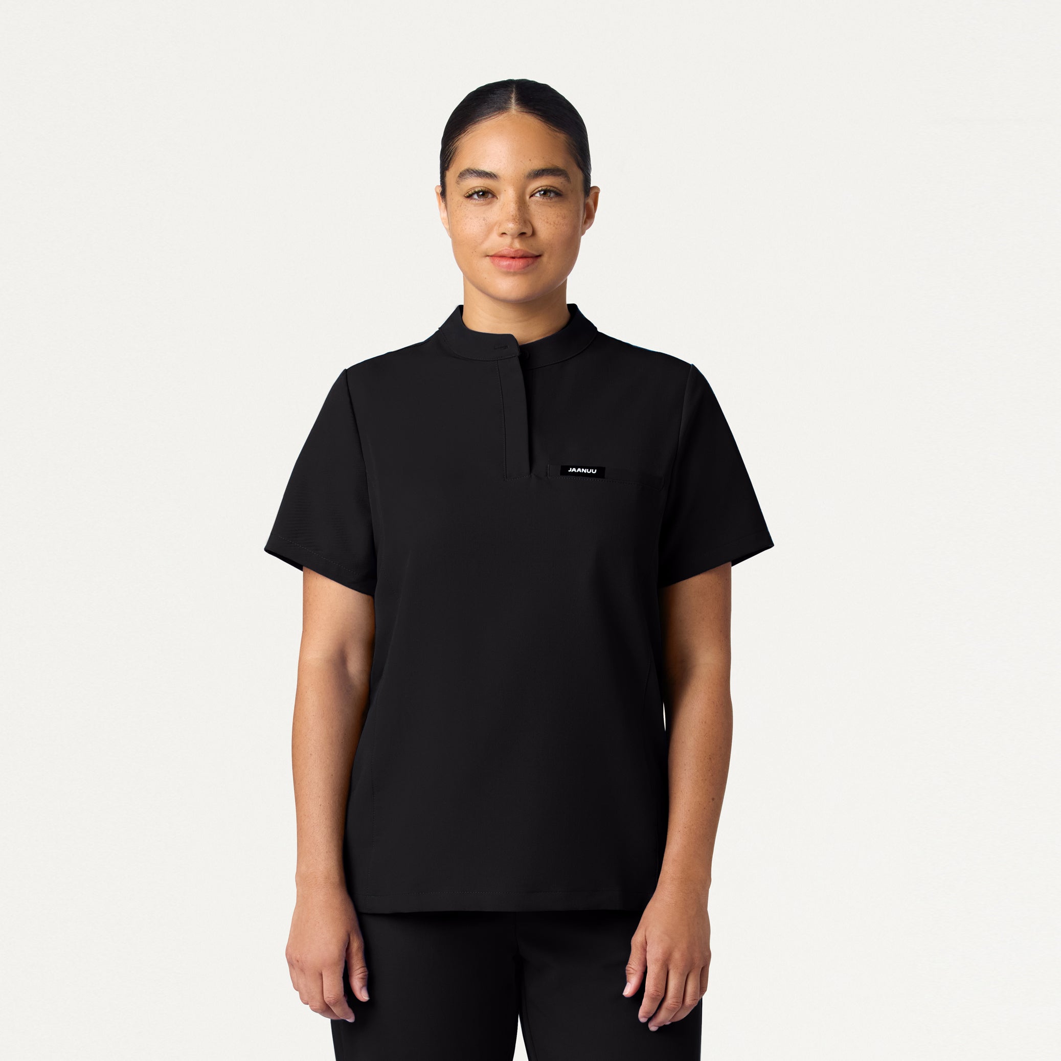Woman wearing Black scrub top