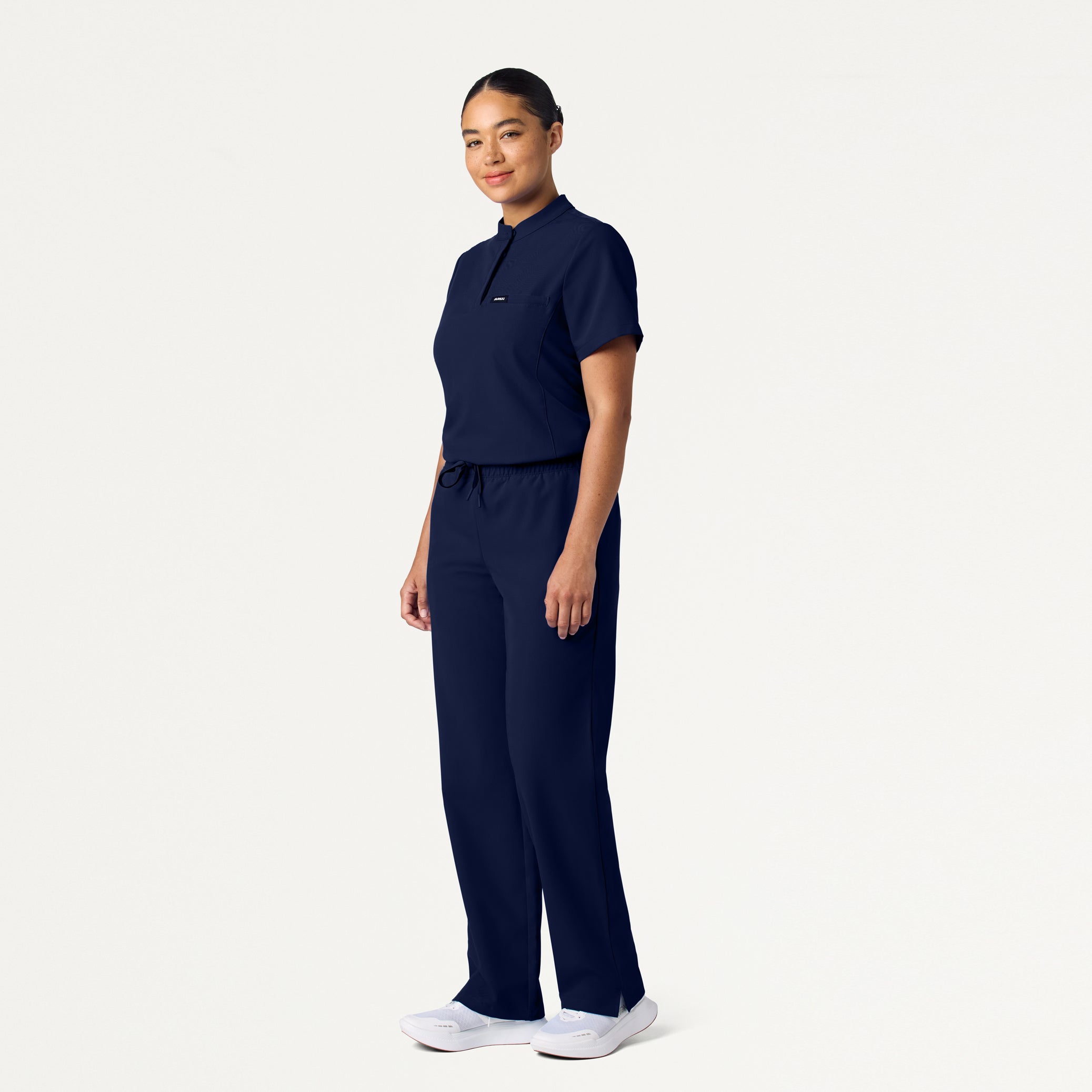Woman wearing Midnight Navy Style Pro Scrub Set
