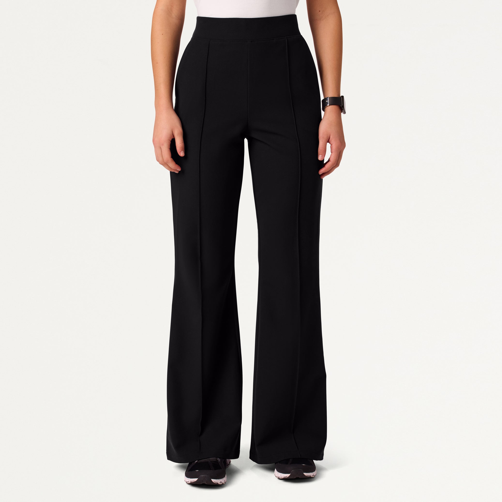 Woman in black scrub pant