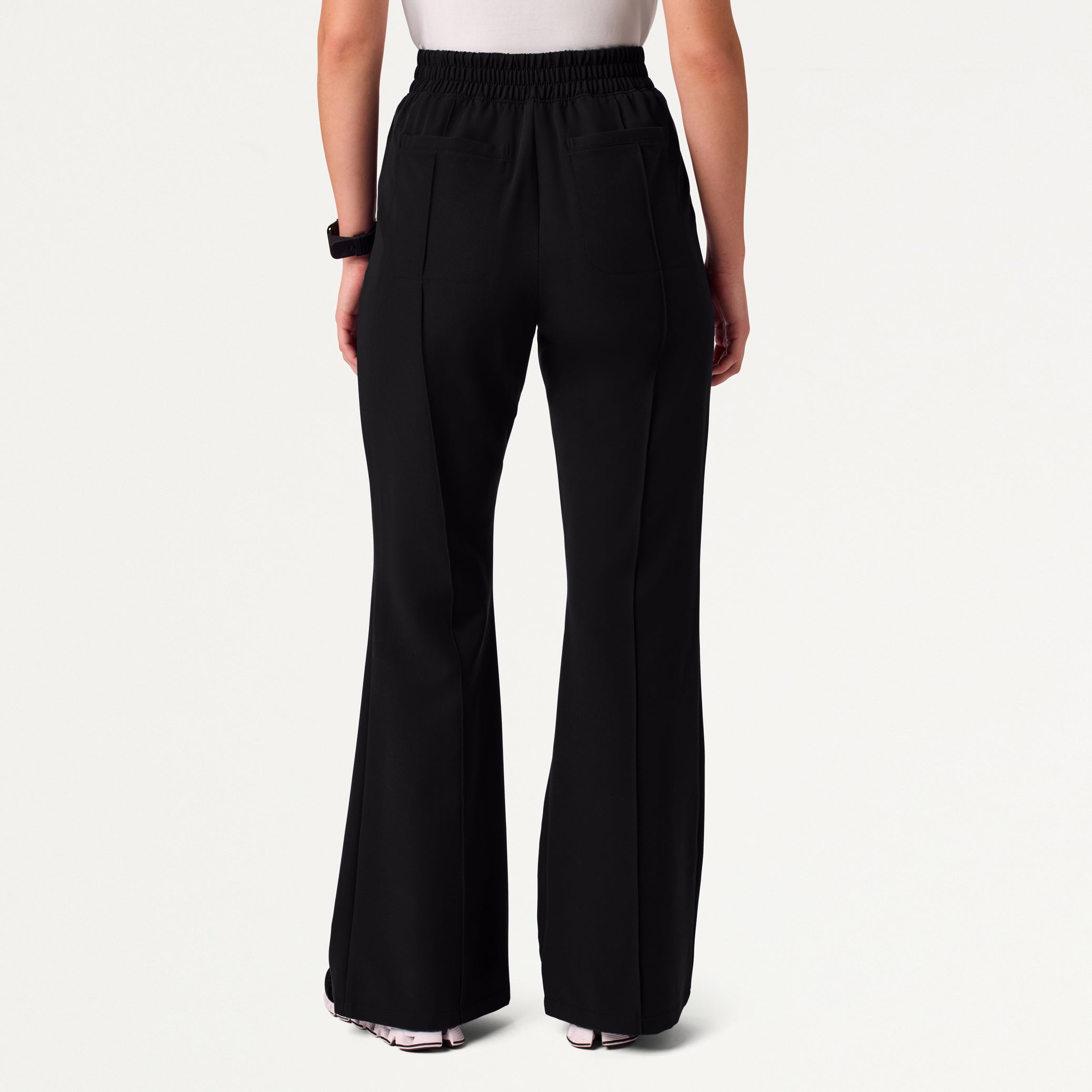 Woman in black scrub pant