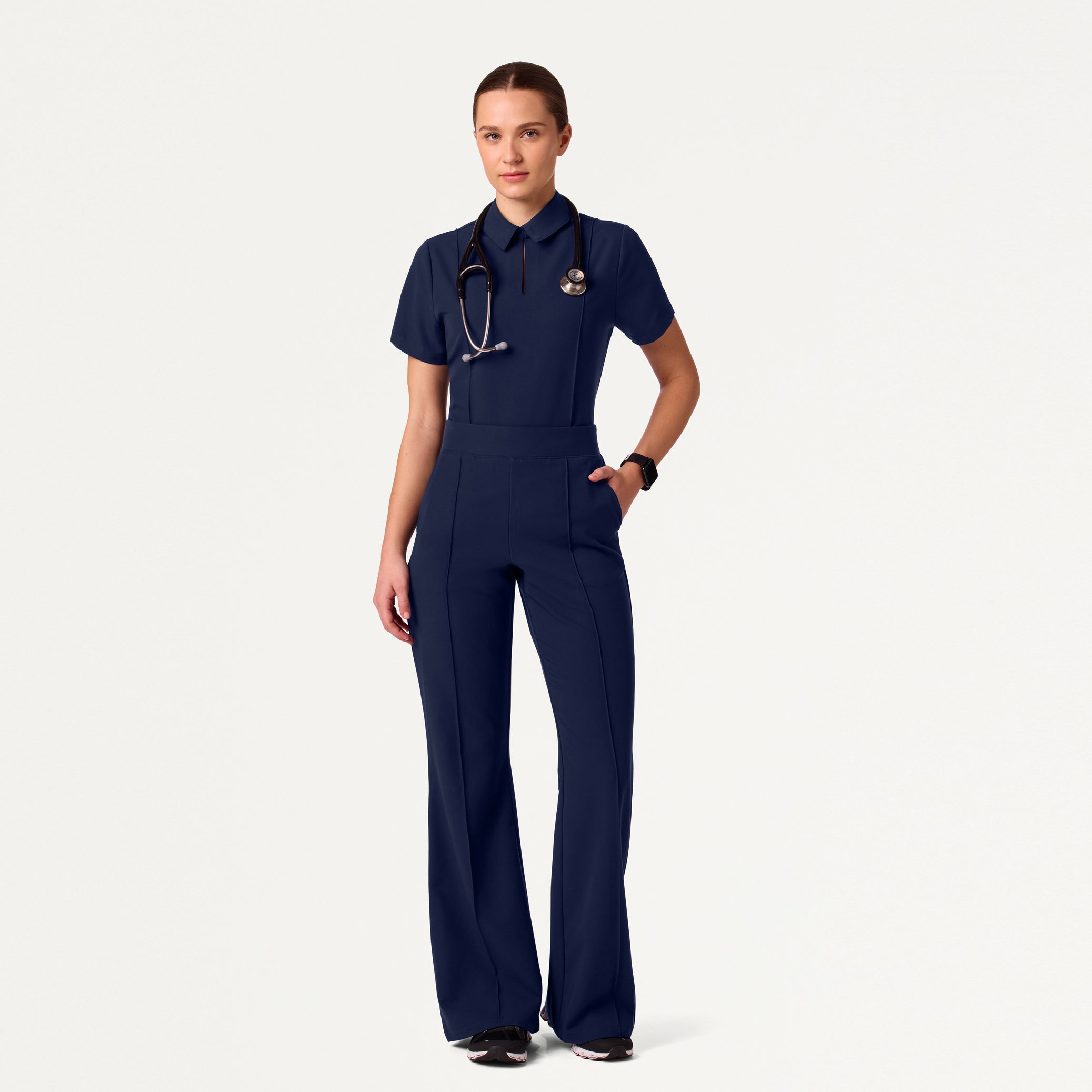 Woman in midnight navy scrub set