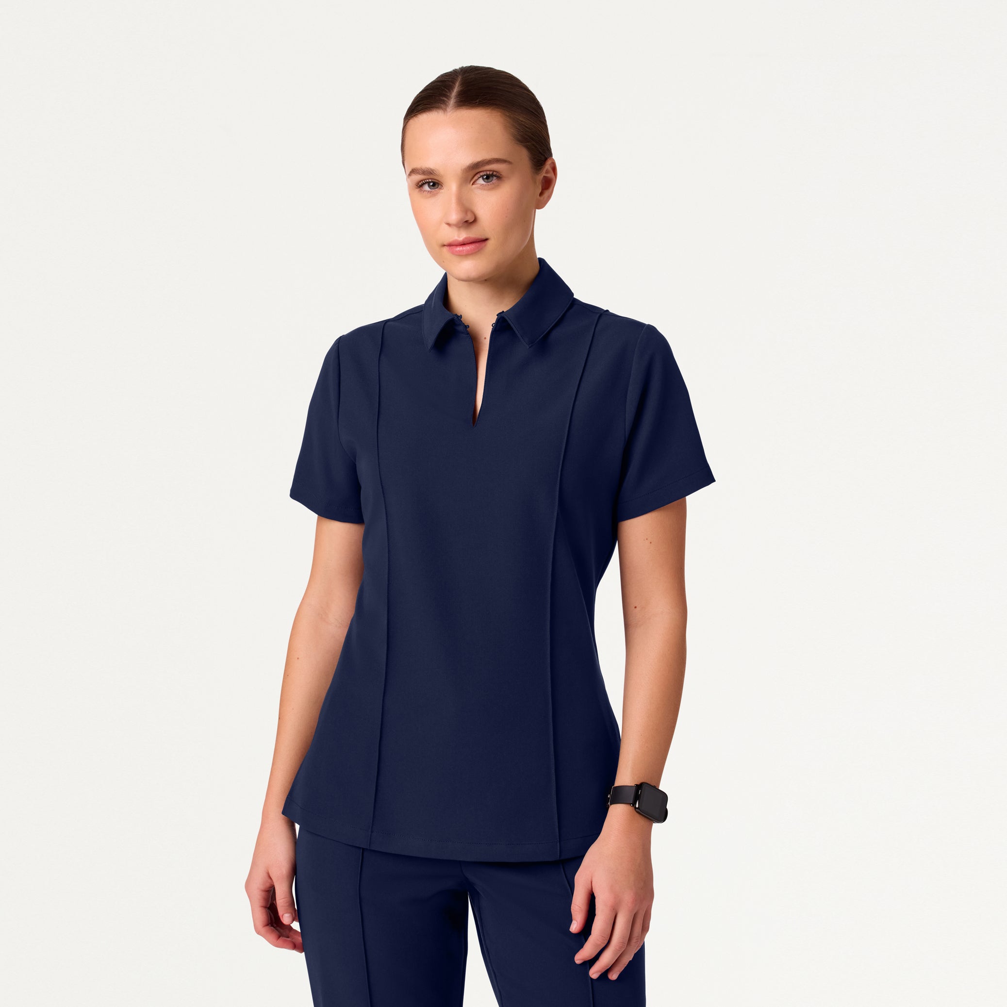 Woman in midnight navy scrub set