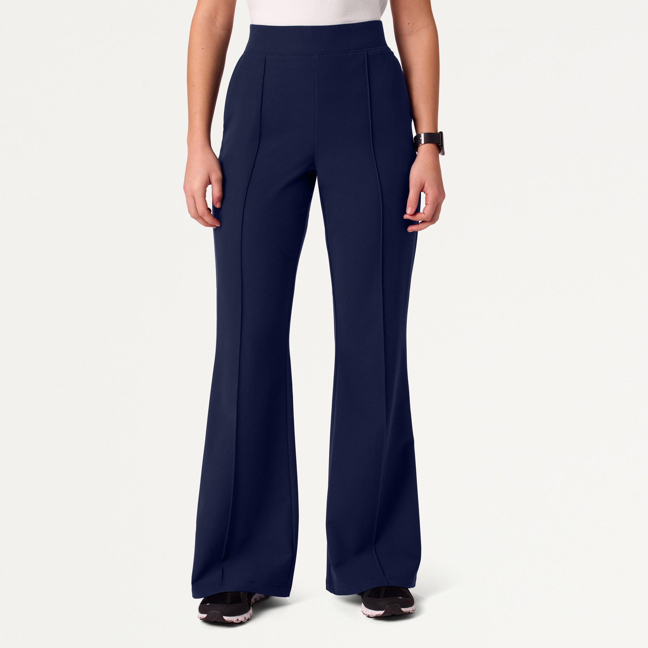 Woman in midnight navy scrub pant