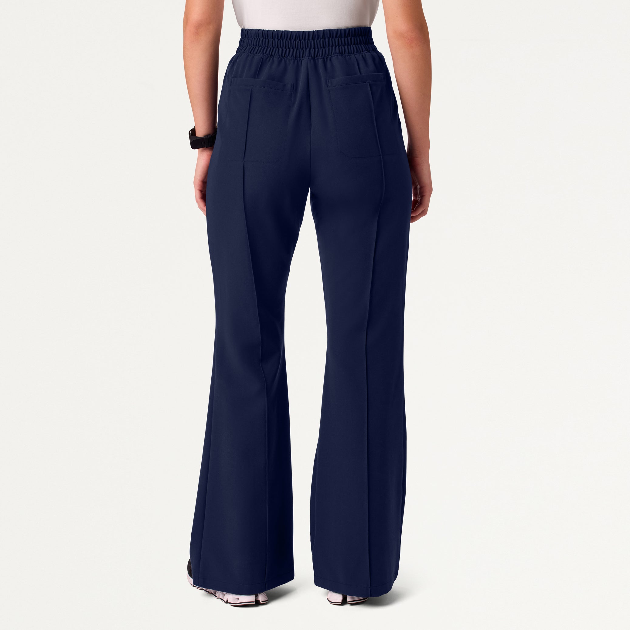 Woman in midnight navy scrub pant
