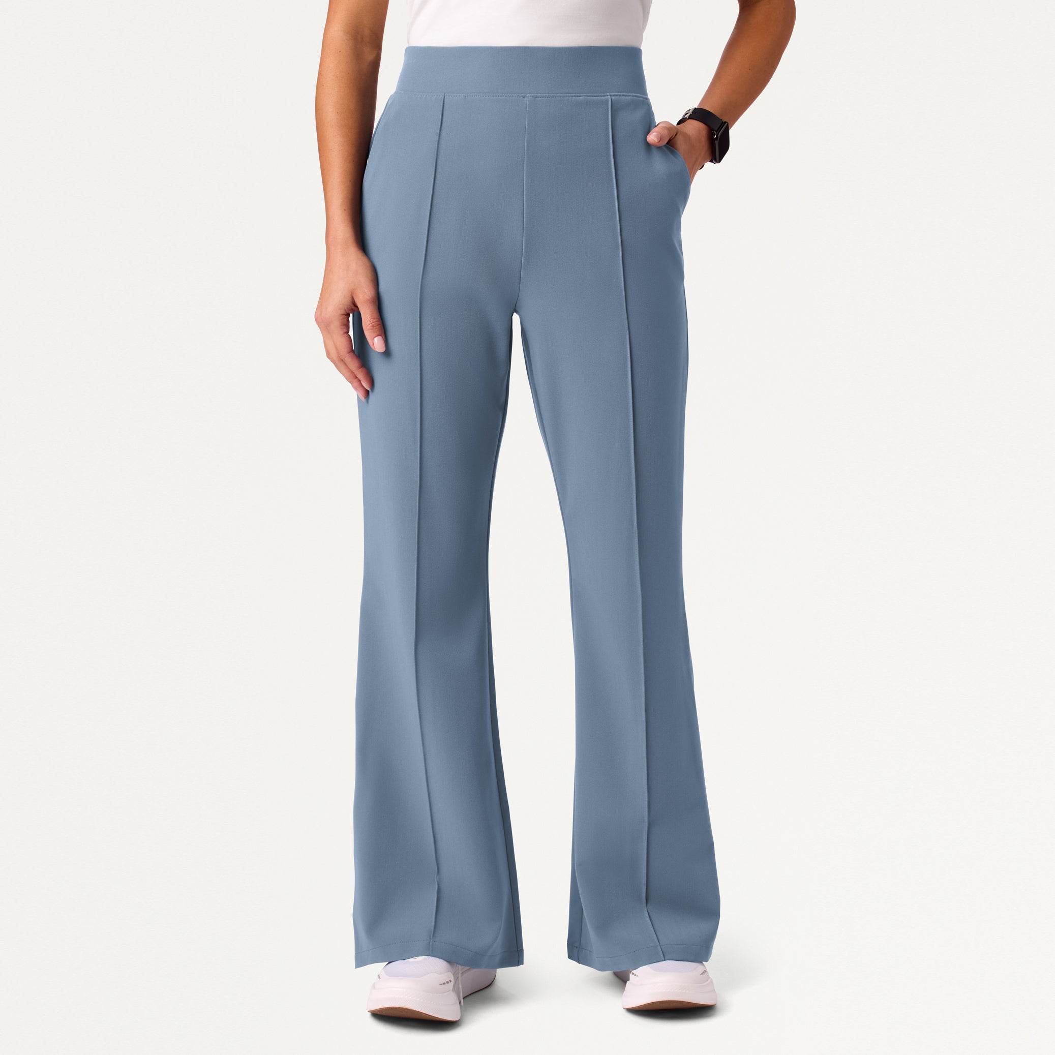 Woman wearing Storm Blue scrub pant